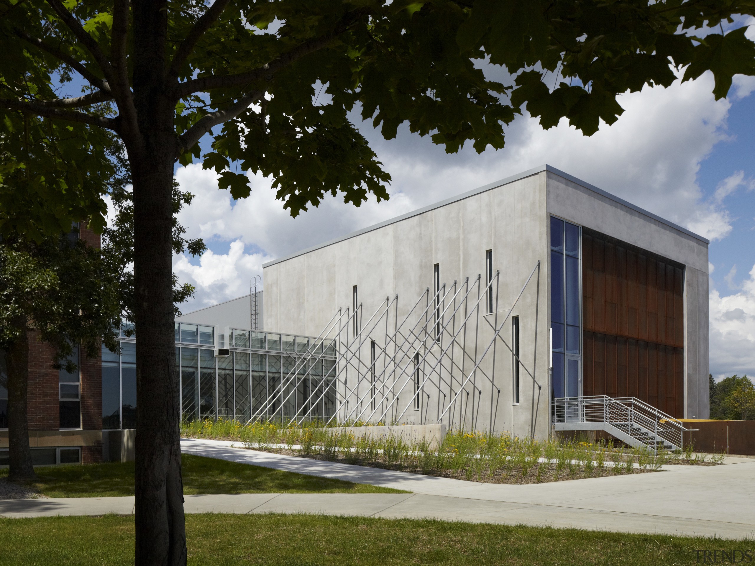 Here is an exterior view of the University architecture, building, corporate headquarters, daytime, facade, headquarters, house, structure, black, gray