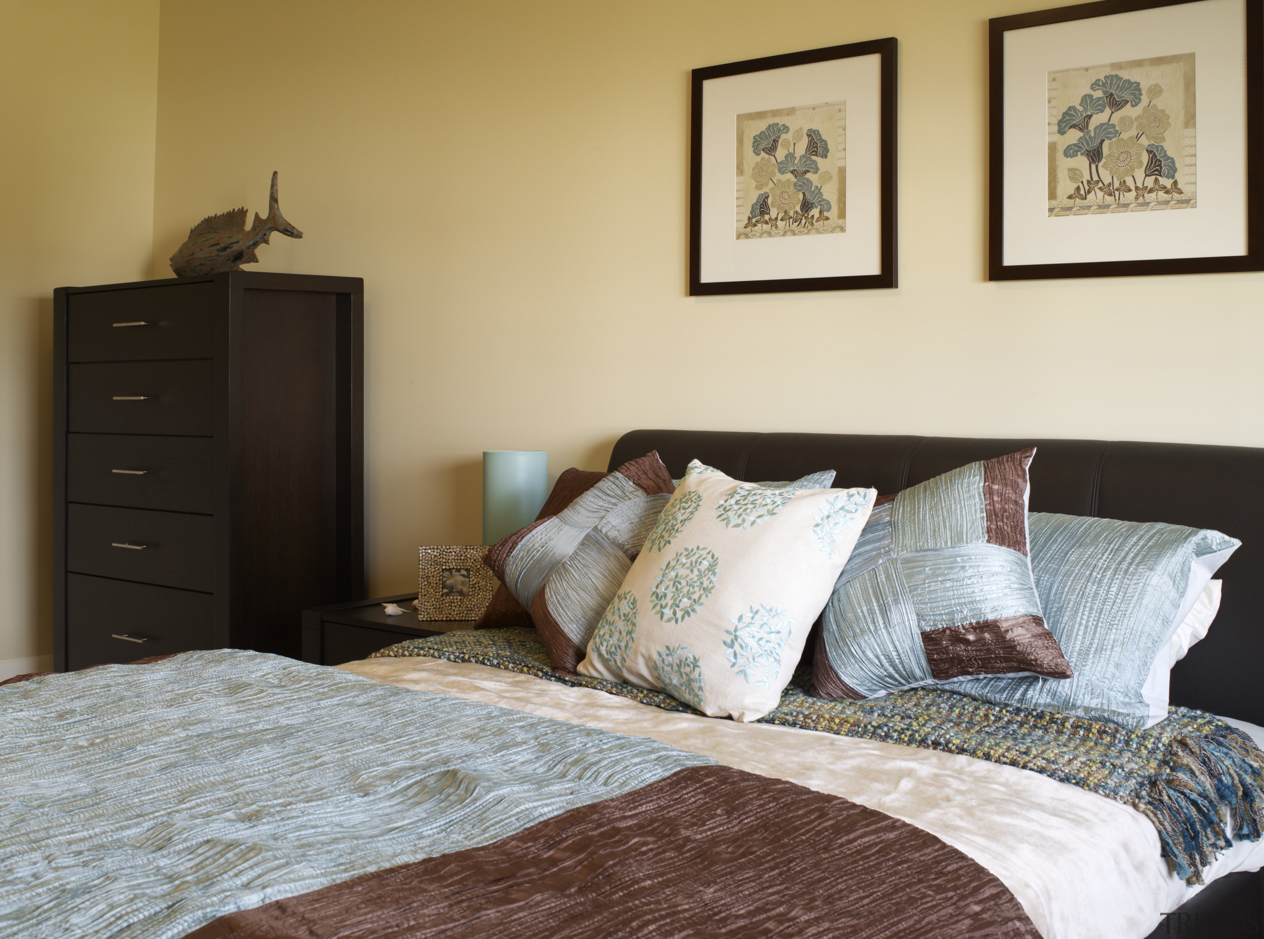 View of the bedroom at this luxury retirement bed, bed frame, bed sheet, bedding, bedroom, duvet cover, furniture, home, interior design, living room, real estate, room, textile, wall, wood