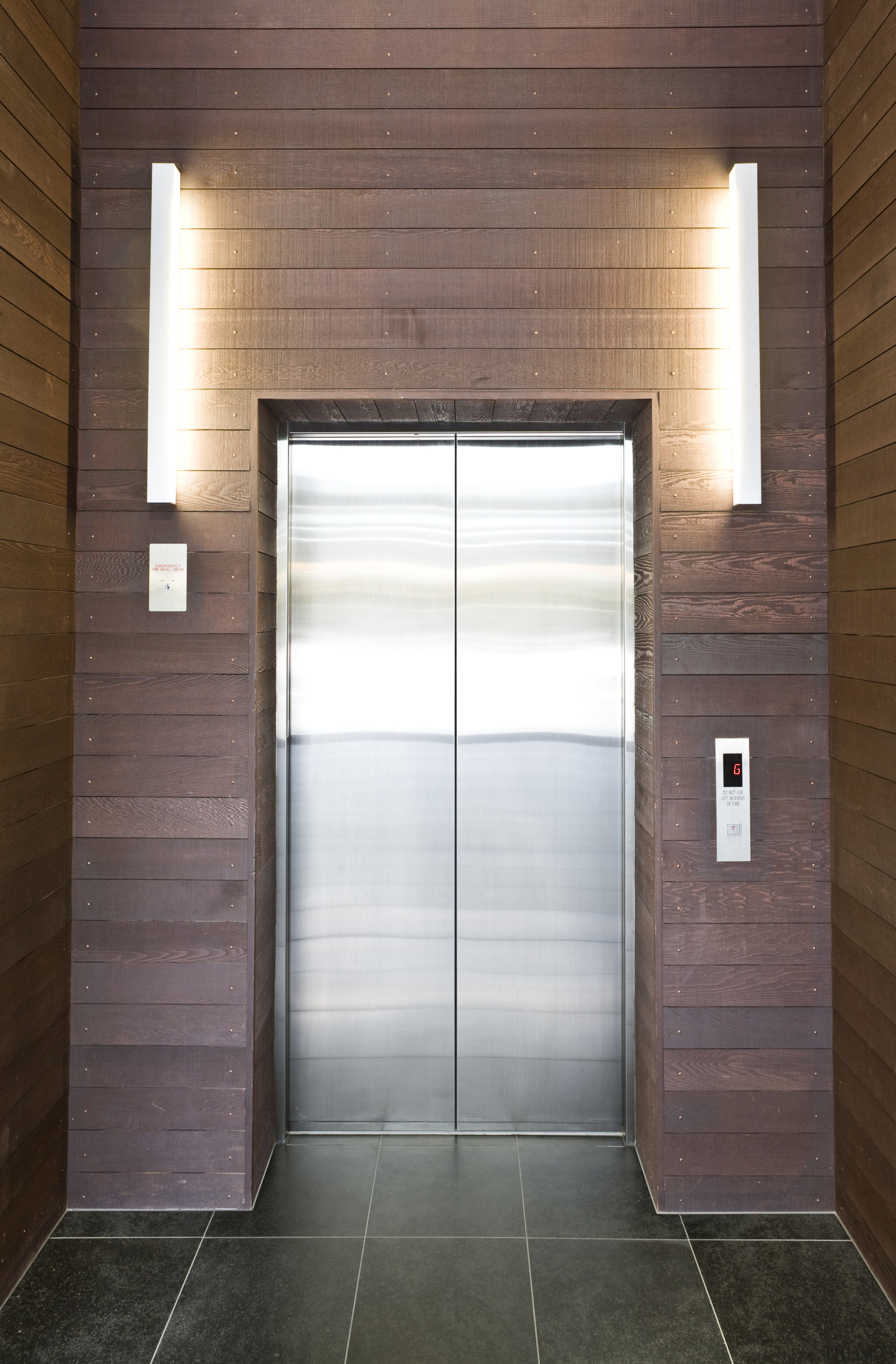 Interior view of the Quest Hotel where they architecture, ceiling, daylighting, door, floor, home, house, interior design, real estate, wall, wood, brown