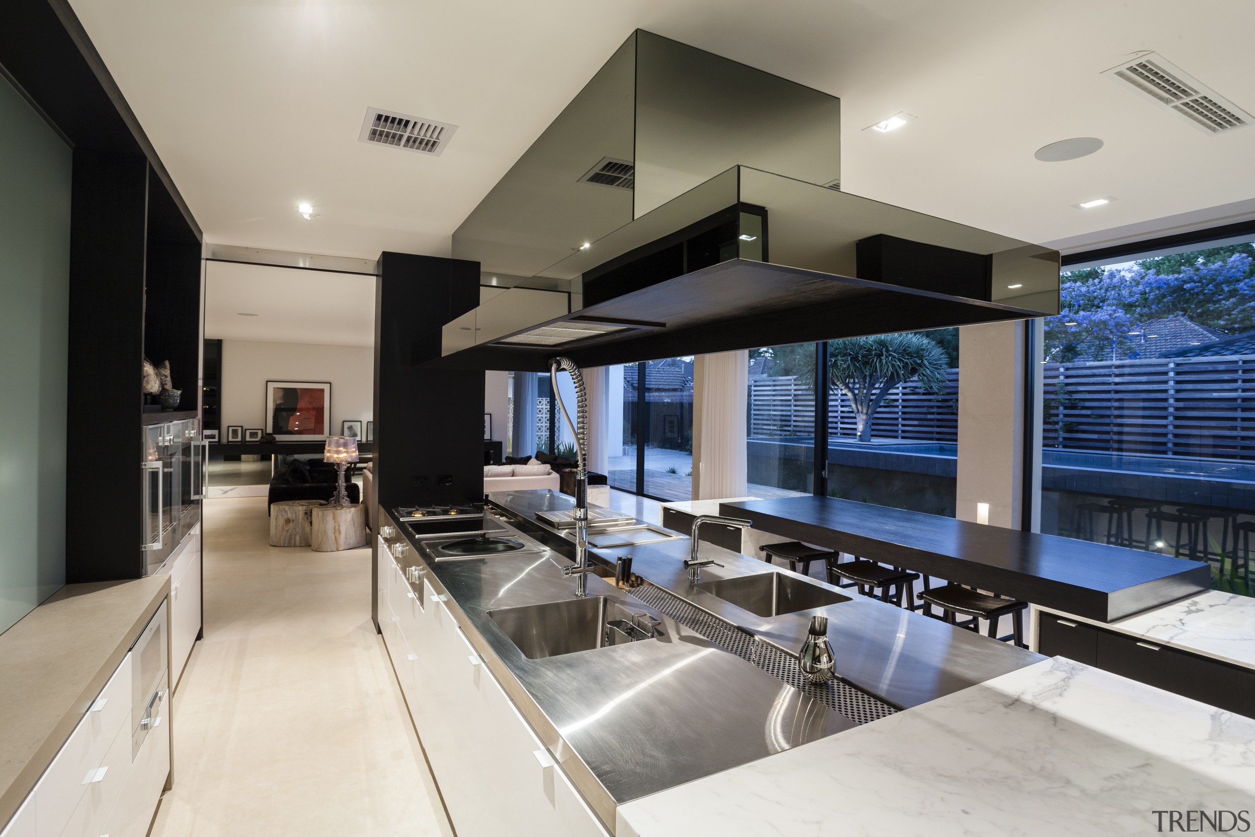 This kitchen is positioned in the hub of house, interior design, real estate, gray