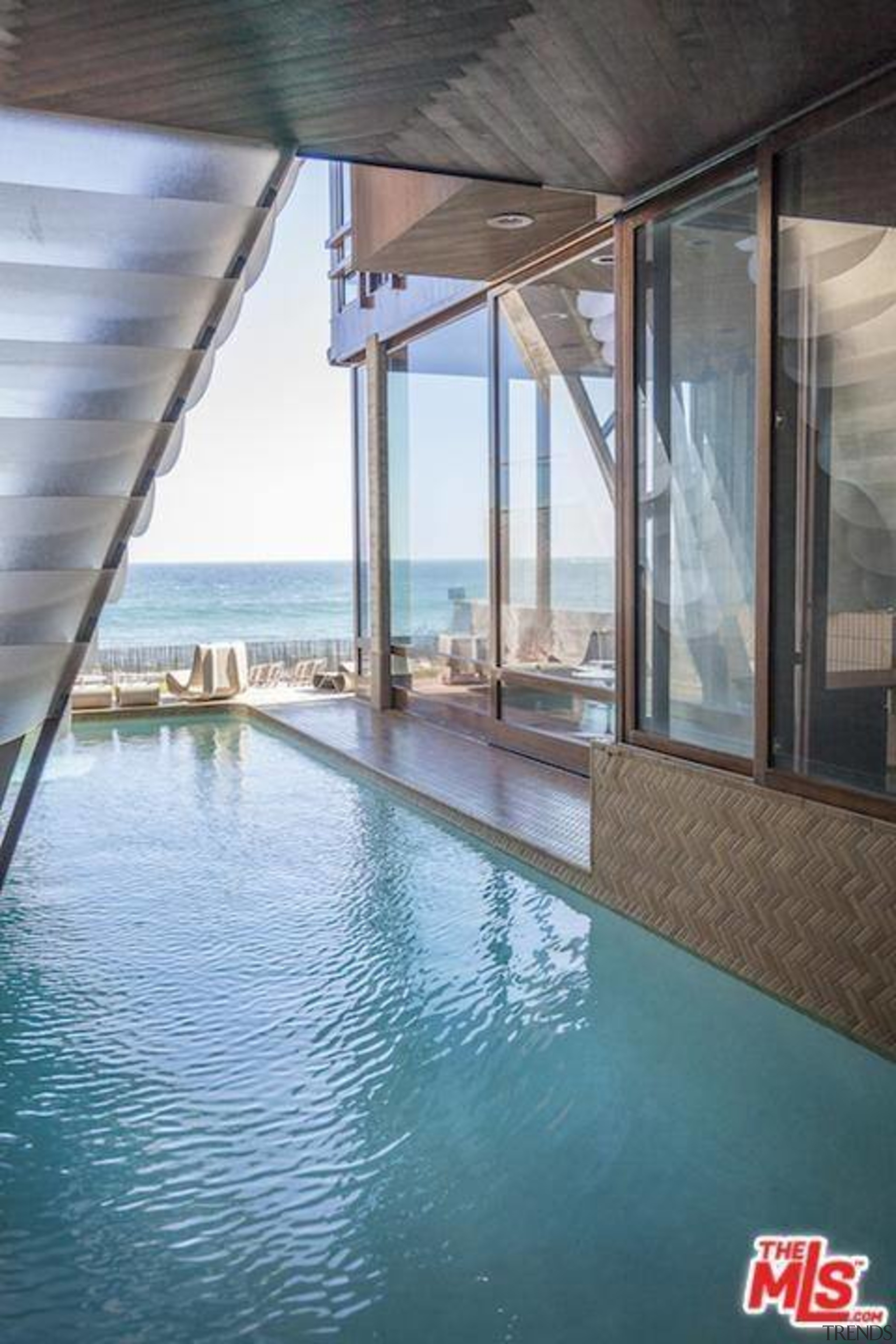 Edward Norton's new Malibu Colony home – Trulia condominium, daylighting, property, real estate, swimming pool, water, window, gray, teal