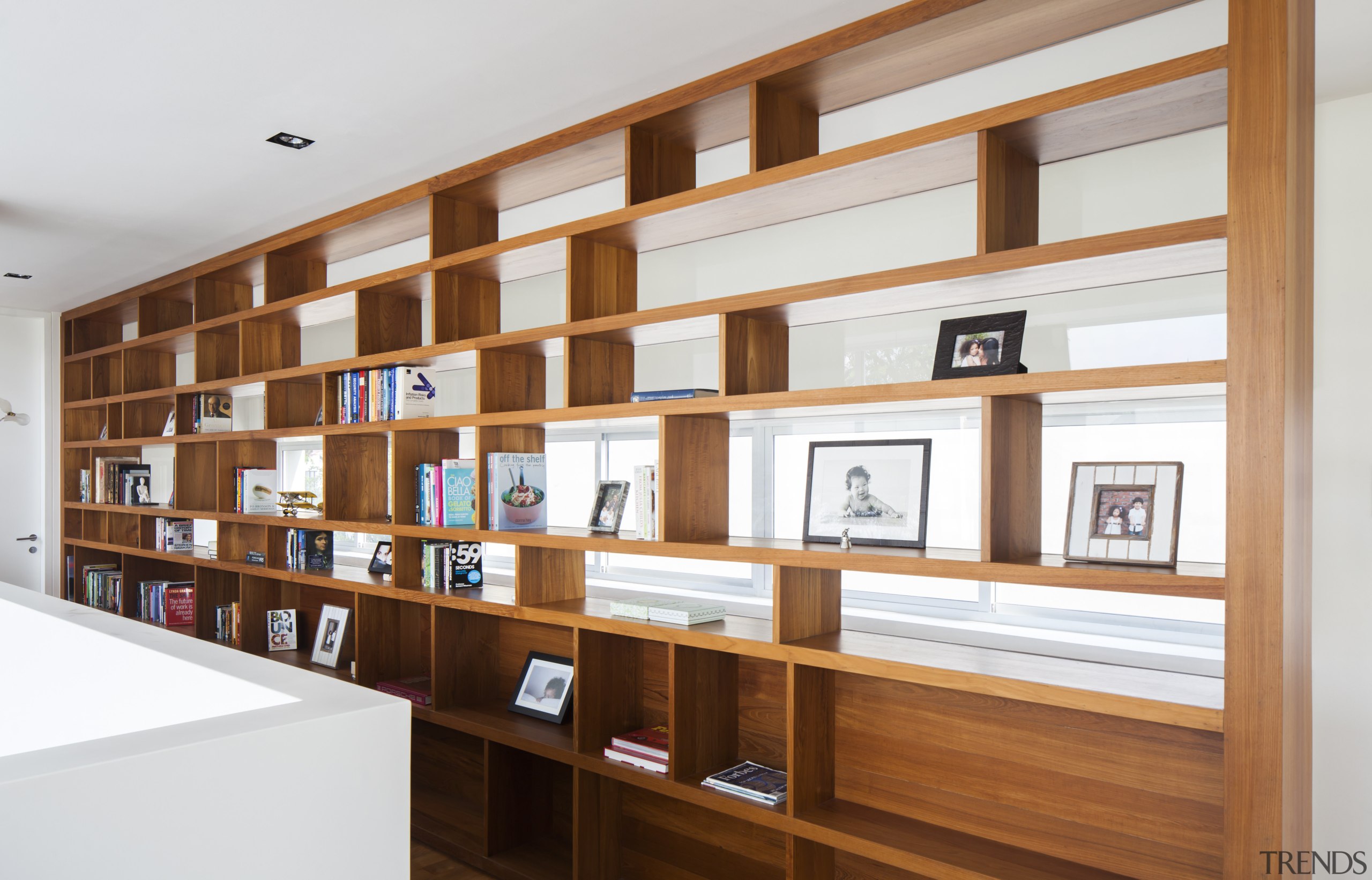 A few simple, assertive design strokes can transform bookcase, furniture, institution, interior design, library, shelf, shelving, white, brown