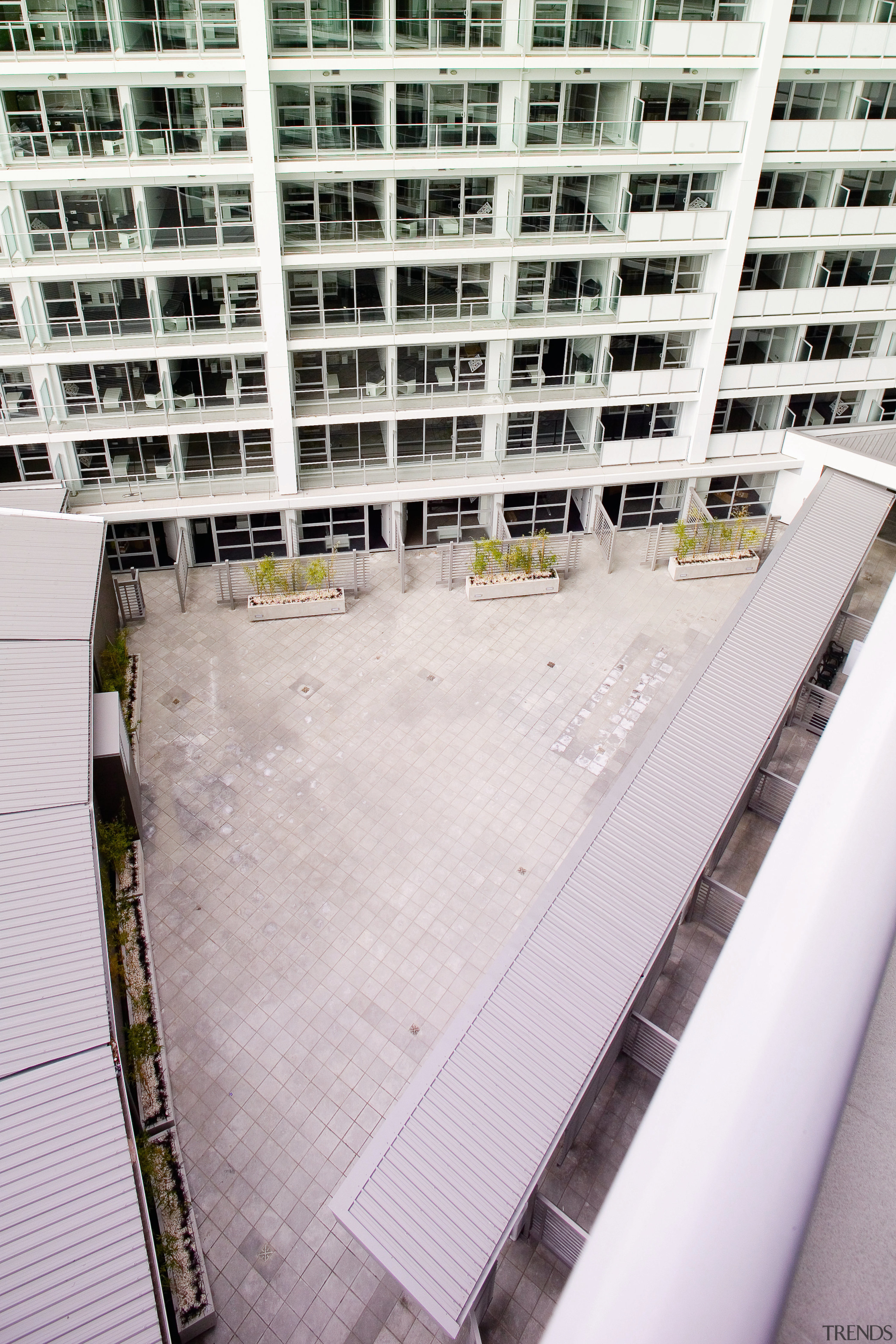 Exterior view of the New Volt apartments with architecture, building, condominium, metropolitan area, skyscraper, urban area, white