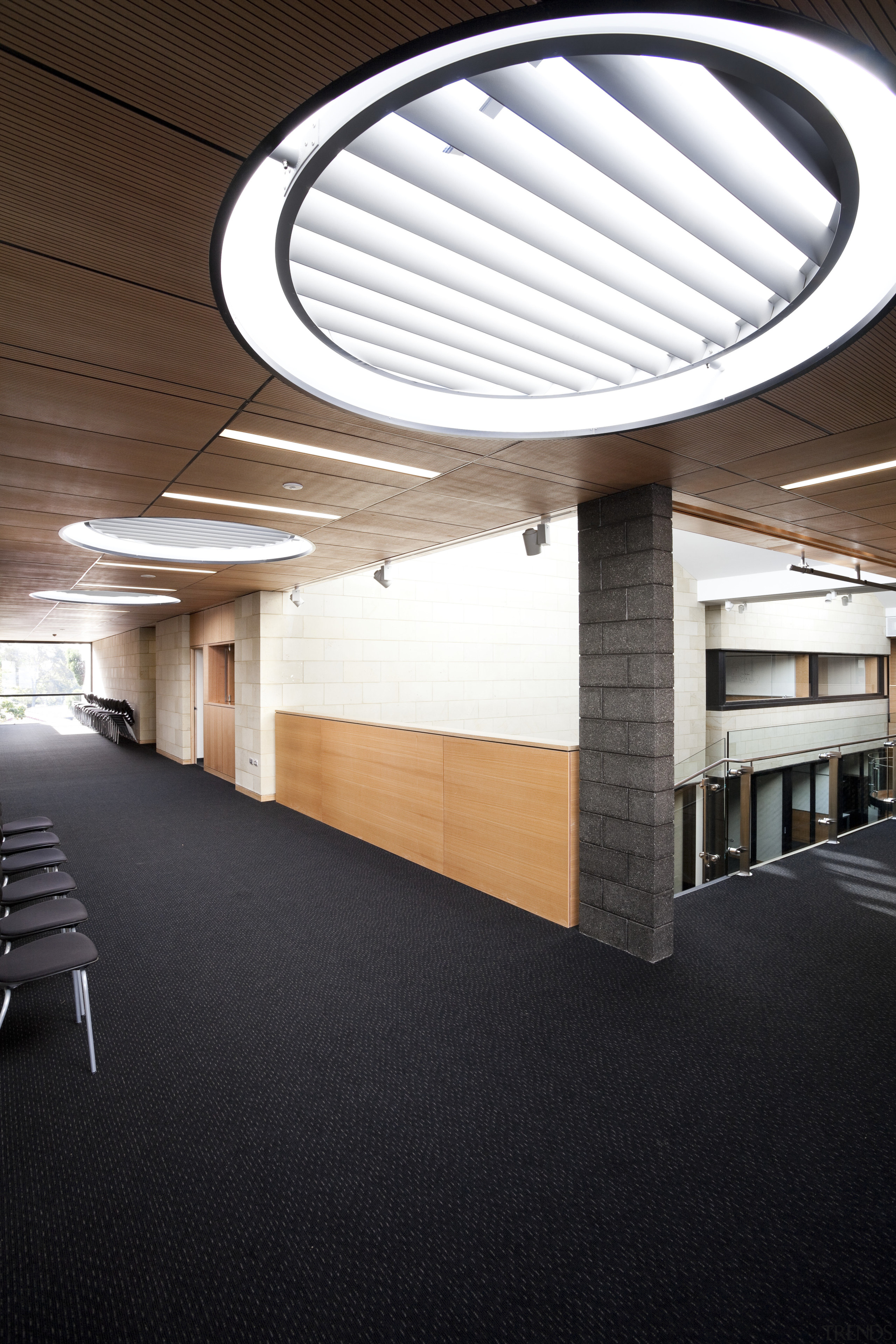 Room with wooden ceiling and round skylight. - architecture, ceiling, daylighting, interior design, line, lobby, structure, window, black, white