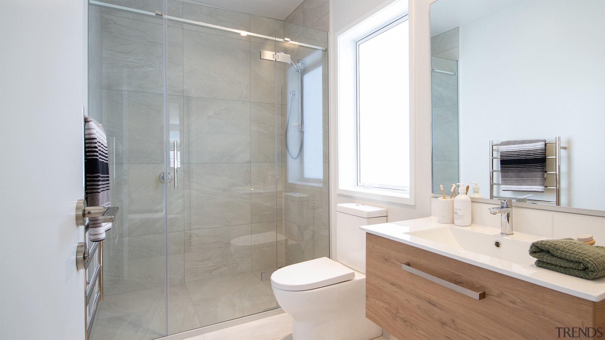 Modern and light-filled, the master ensuite has a 