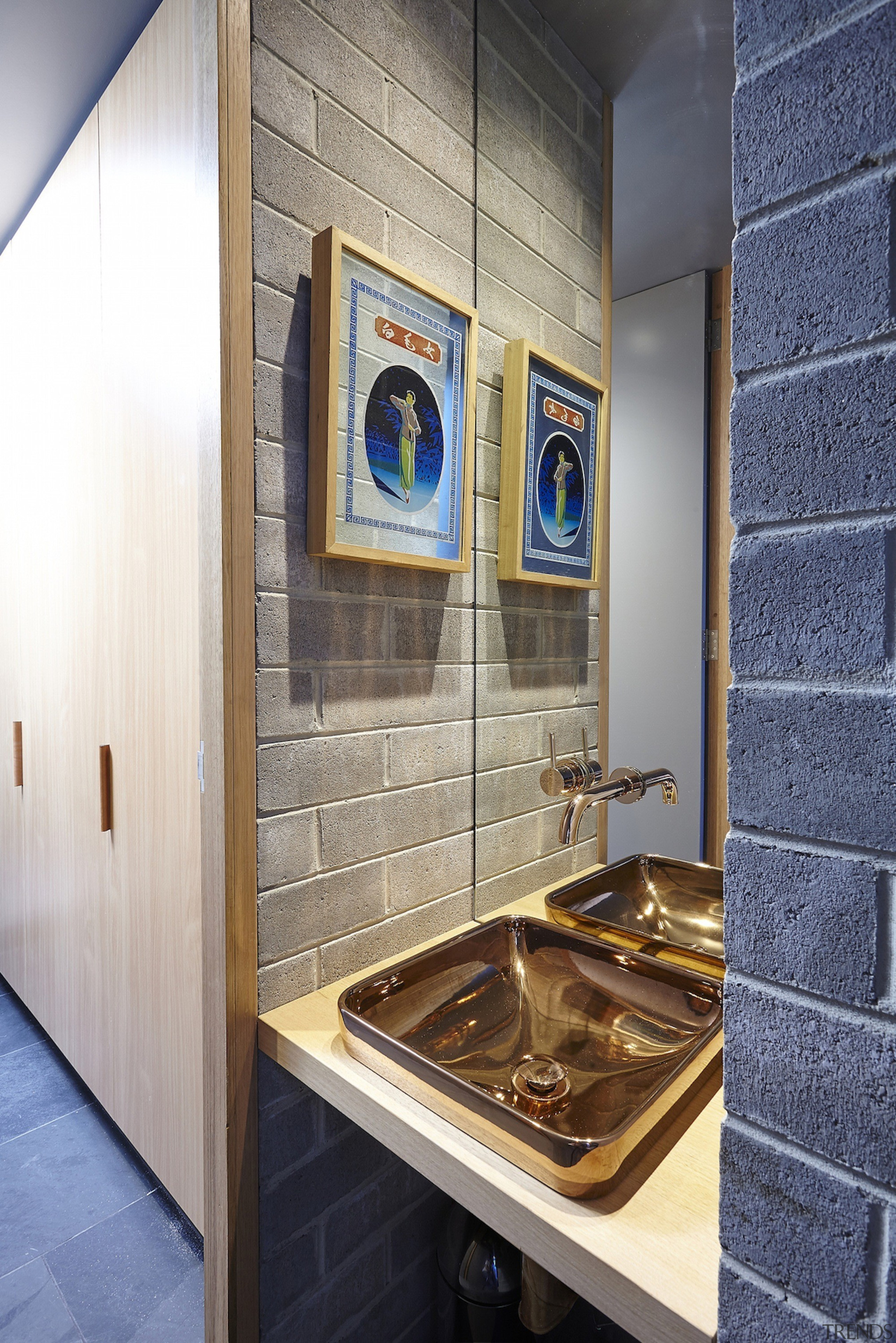 Exposed brick surrounds the brass sink - Exposed bathroom, countertop, floor, flooring, interior design, room, tile, gray, white