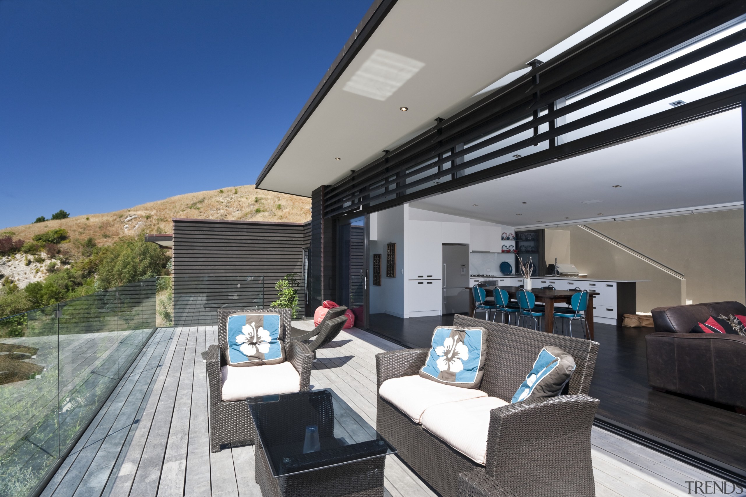 View of outdoor living space featuring glass hand apartment, architecture, estate, home, house, interior design, penthouse apartment, property, real estate, roof, gray