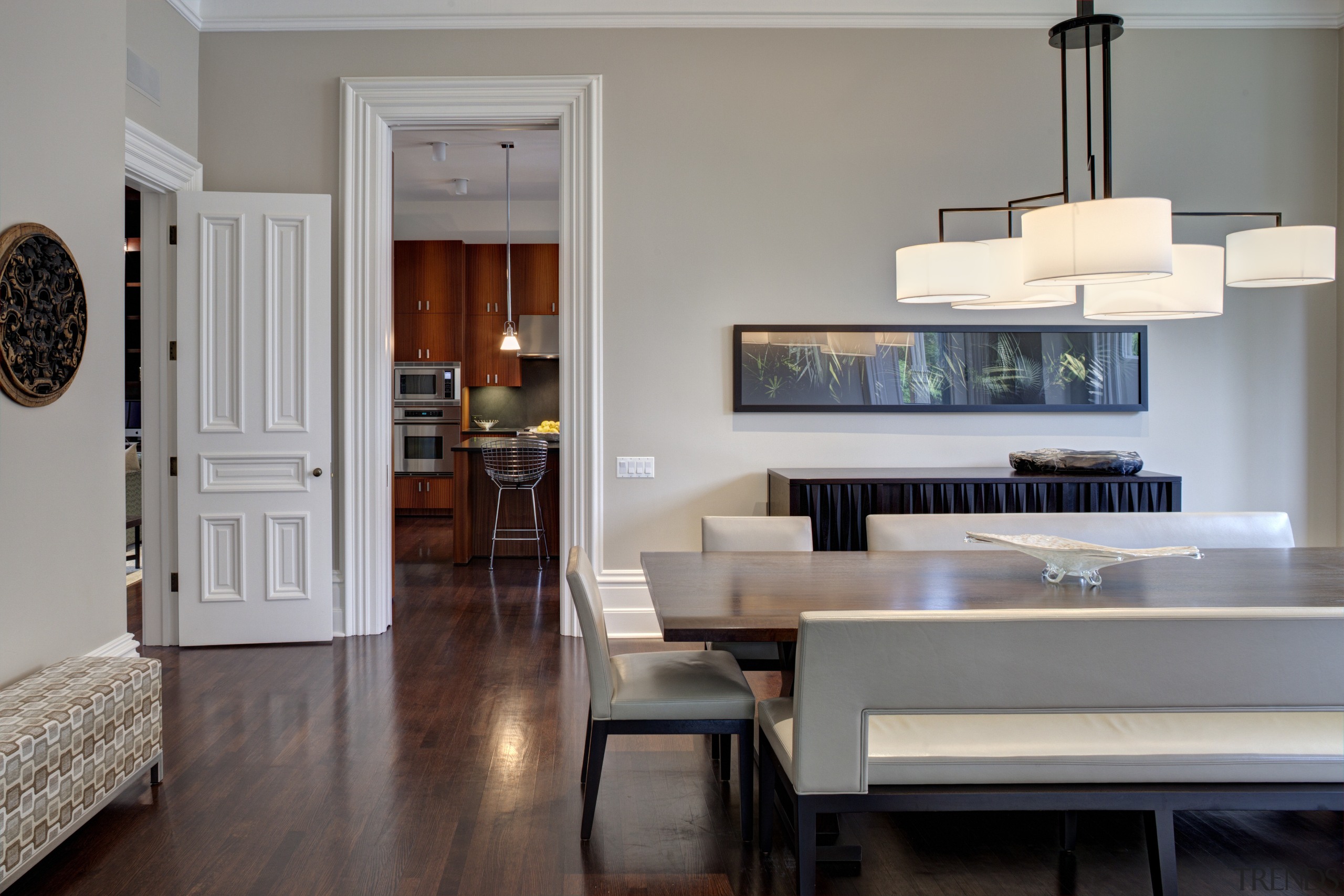 Crisp simplicity defines this contemporary kitchen in an floor, flooring, furniture, hardwood, home, interior design, living room, room, table, wood flooring, gray