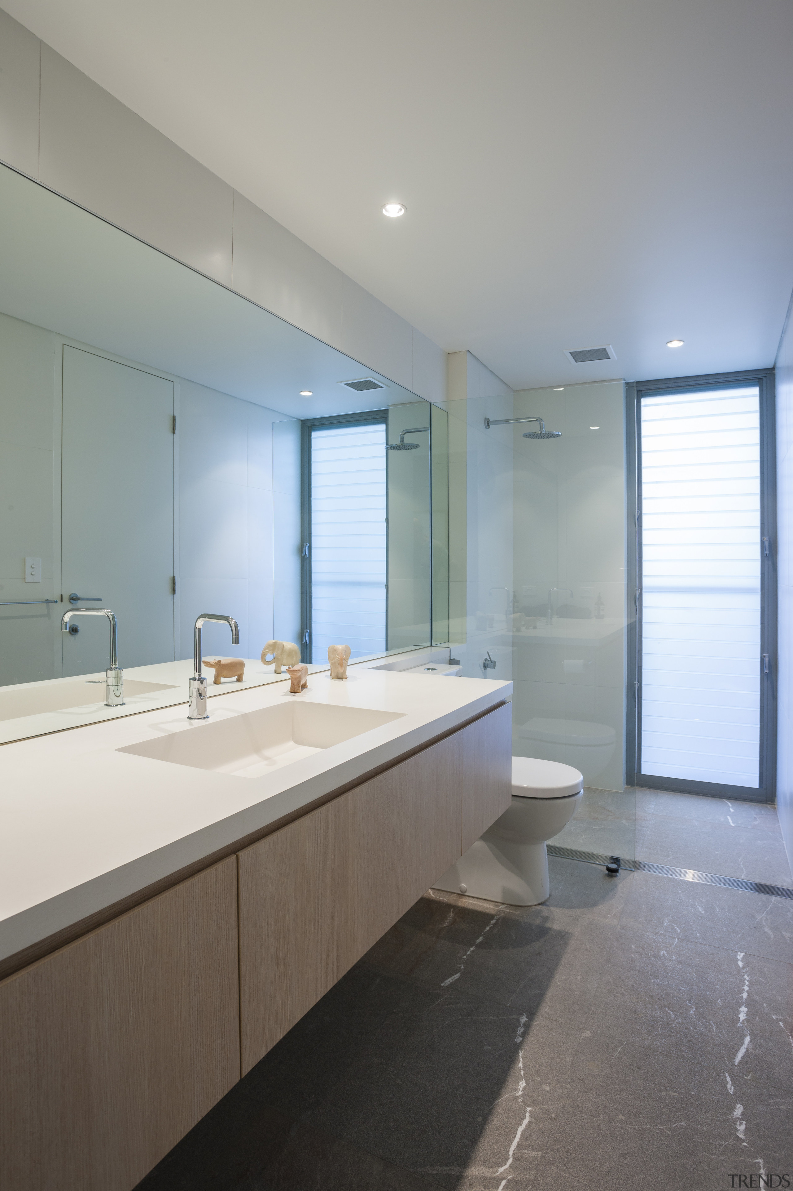 Bathroom with large wall mirror. - Bathroom with architecture, bathroom, ceiling, daylighting, home, house, interior design, real estate, room, sink, gray