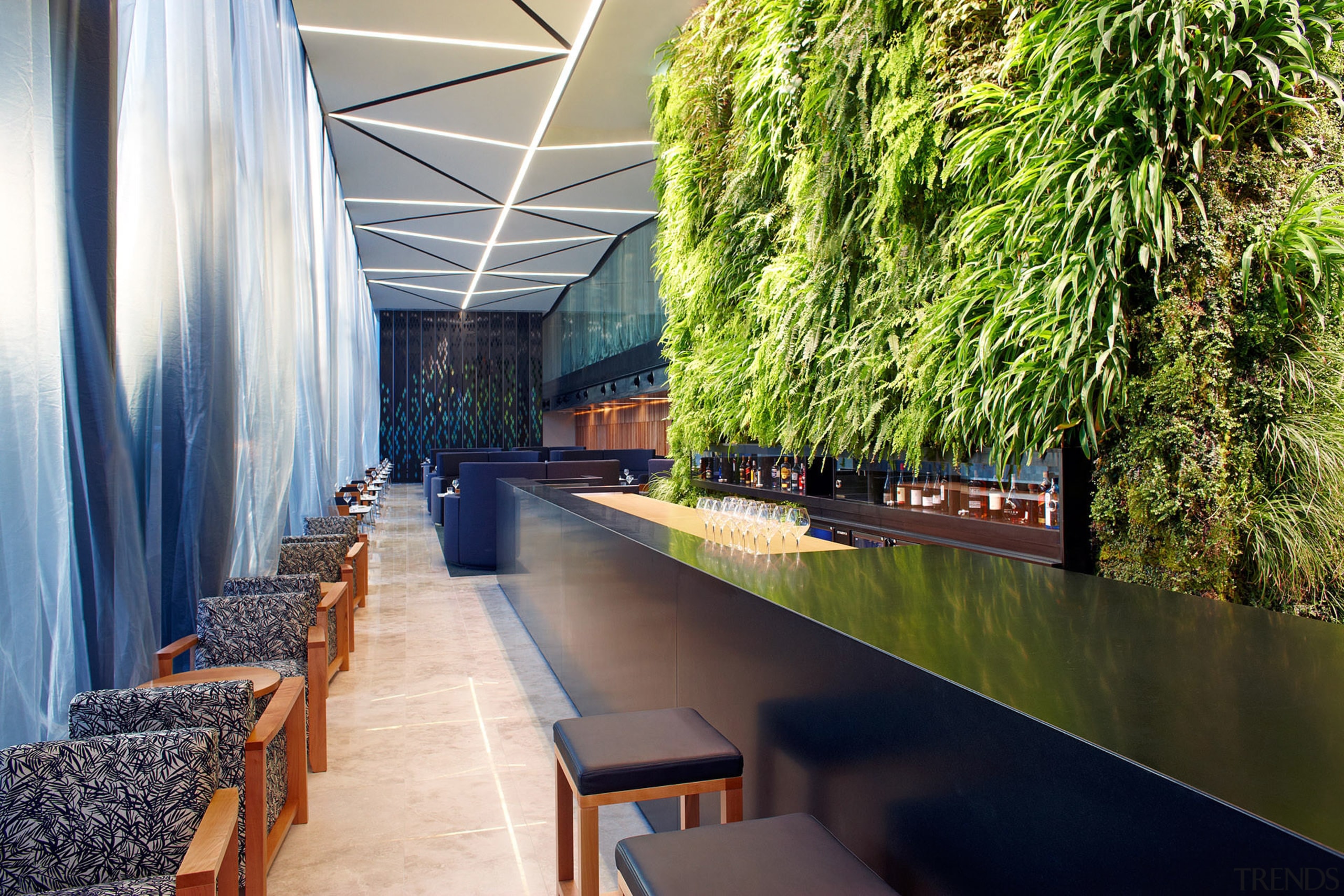 The Square Bar at Novotel Auckland Airport includes architecture, plant, real estate, tree, water