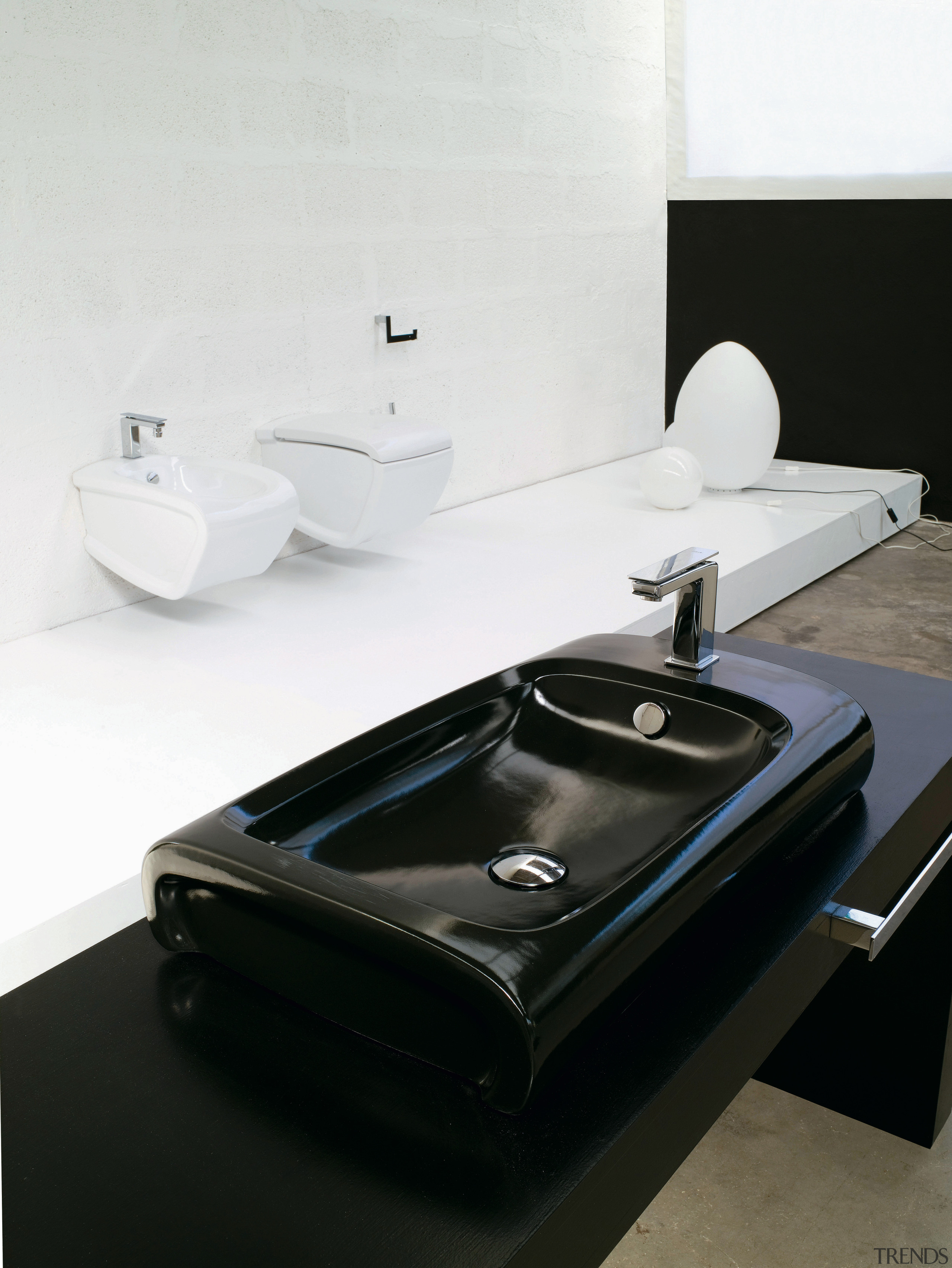 View of a bathroom which features Italian designed bathroom sink, plumbing fixture, product design, sink, tap, white, black