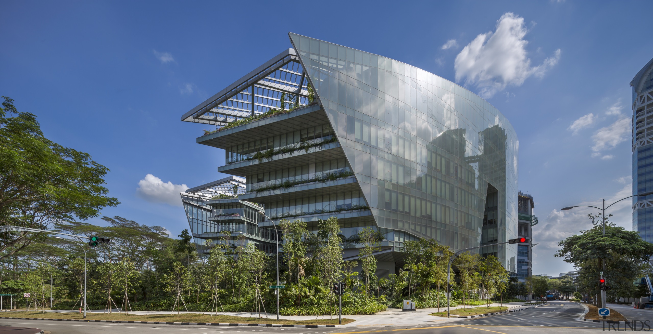 Contemporary horseshoe-shaped office building in Singapore with dramatic architecture, building, city, commercial building, condominium, corporate headquarters, daytime, facade, headquarters, metropolis, metropolitan area, mixed use, real estate, sky, skyscraper, tower block, teal