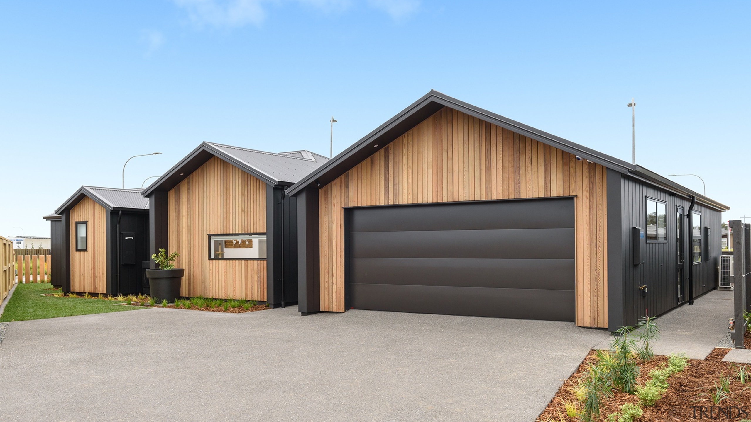 HIS Home - building | facade | garage building, facade, garage, home, house, property, real estate, shed, siding, teal, gray