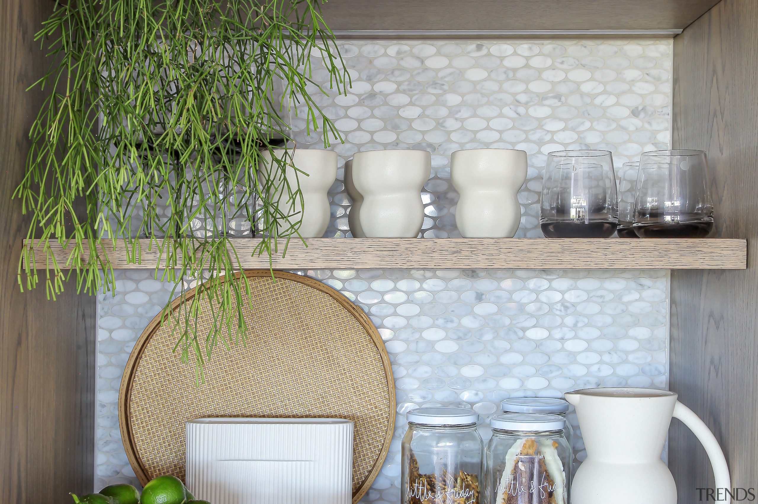 The appliance pantry interior also features refined finishes. 