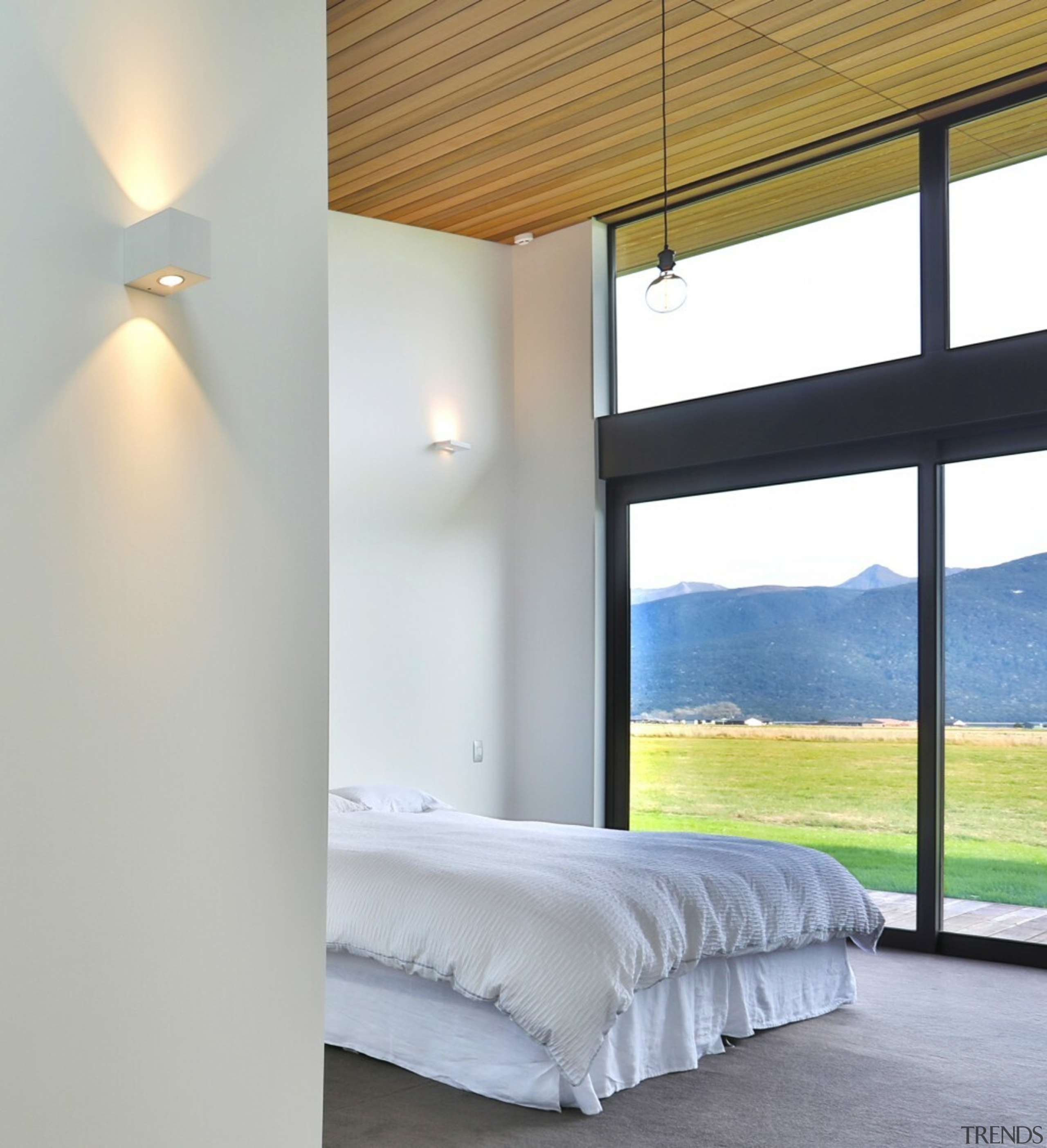 Master bedroom with timber ceiling and spectacular outlook. 