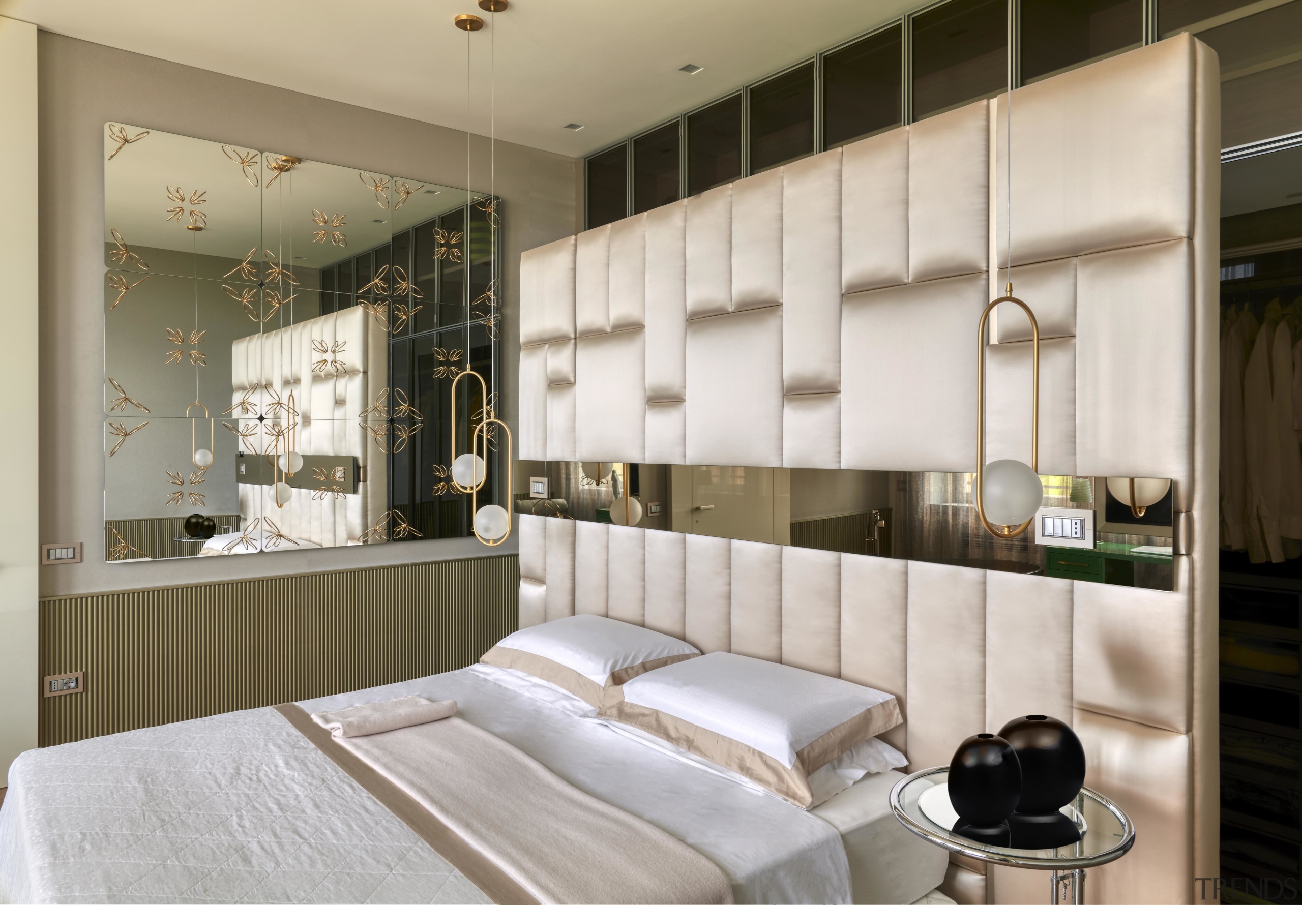 On the upper floor, the master bedroom is 