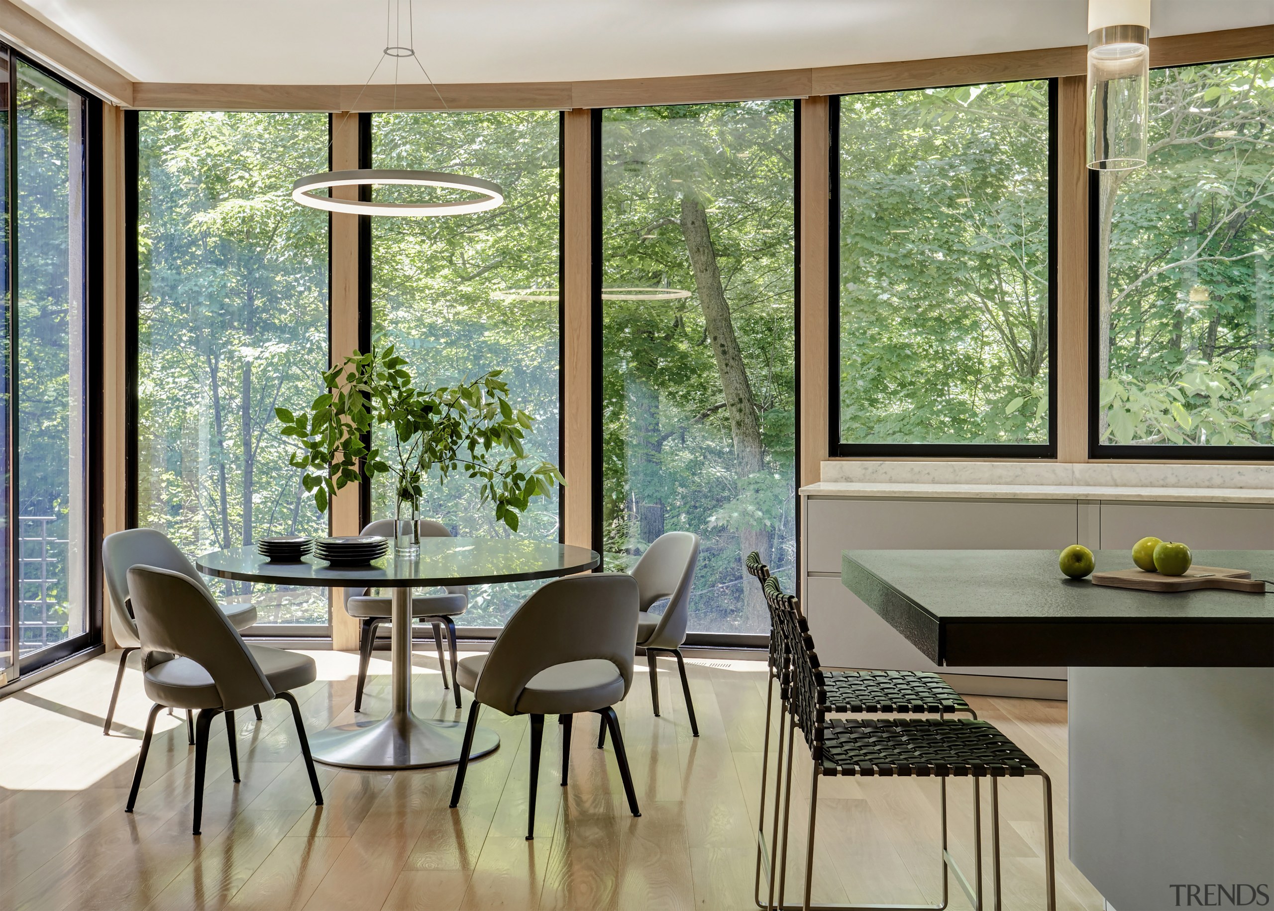 A curved wall of windows in this original architecture, building, ceiling, chair, daylighting, dining room, door, floor, furniture, glass, hardwood, home, house, interior design, property, room, shade, table, window, gray