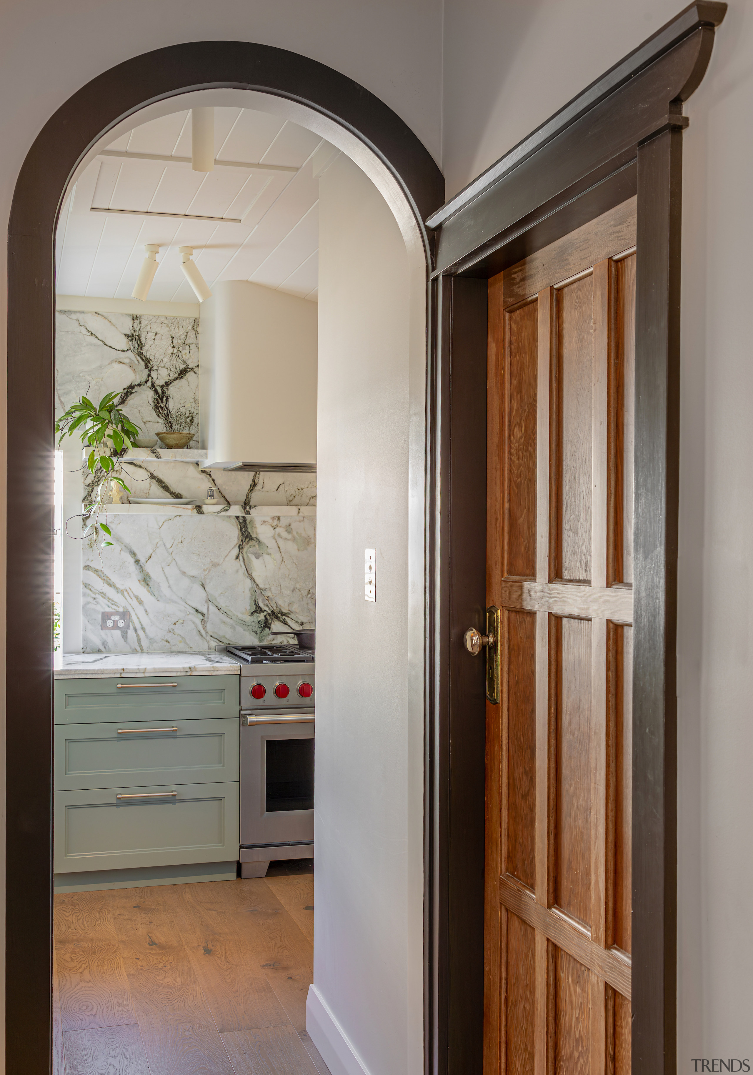 Looking through the new arched doorway into teh 