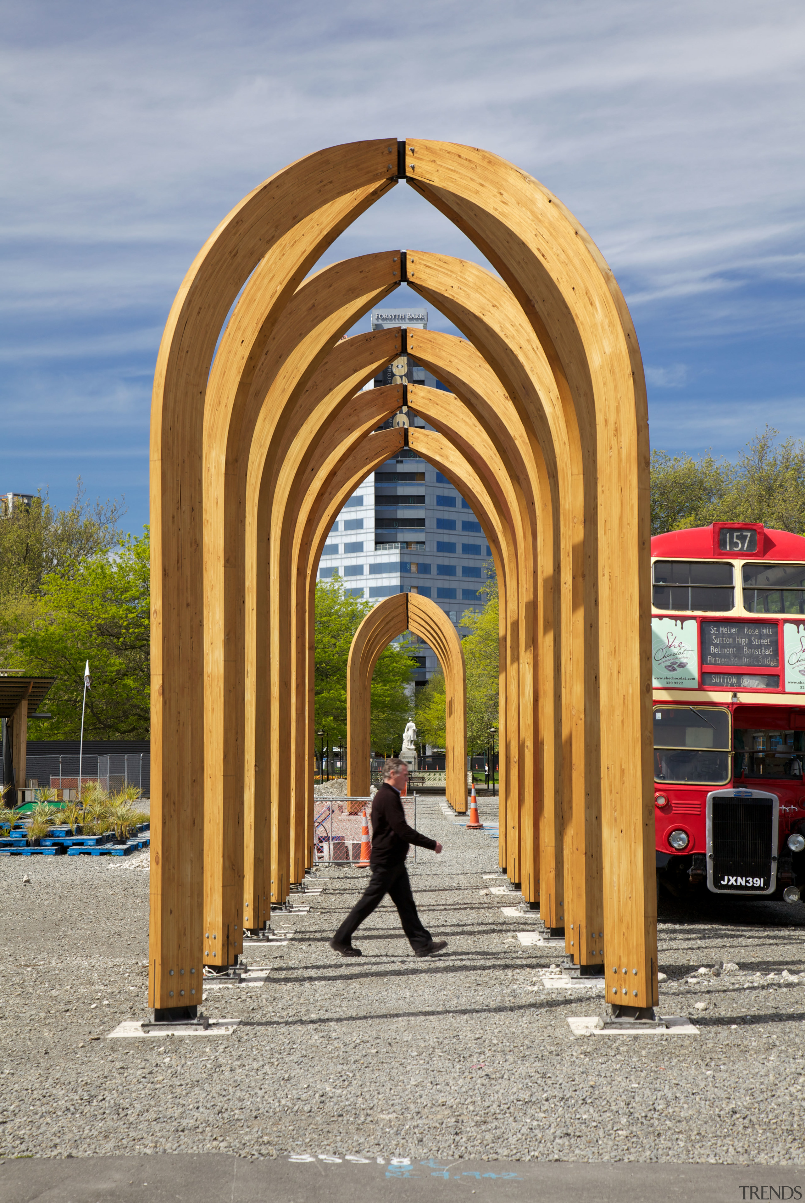 The Arcades is a collaboration between Ryan Reynolds, arch, architecture, sky, structure, wood, gray