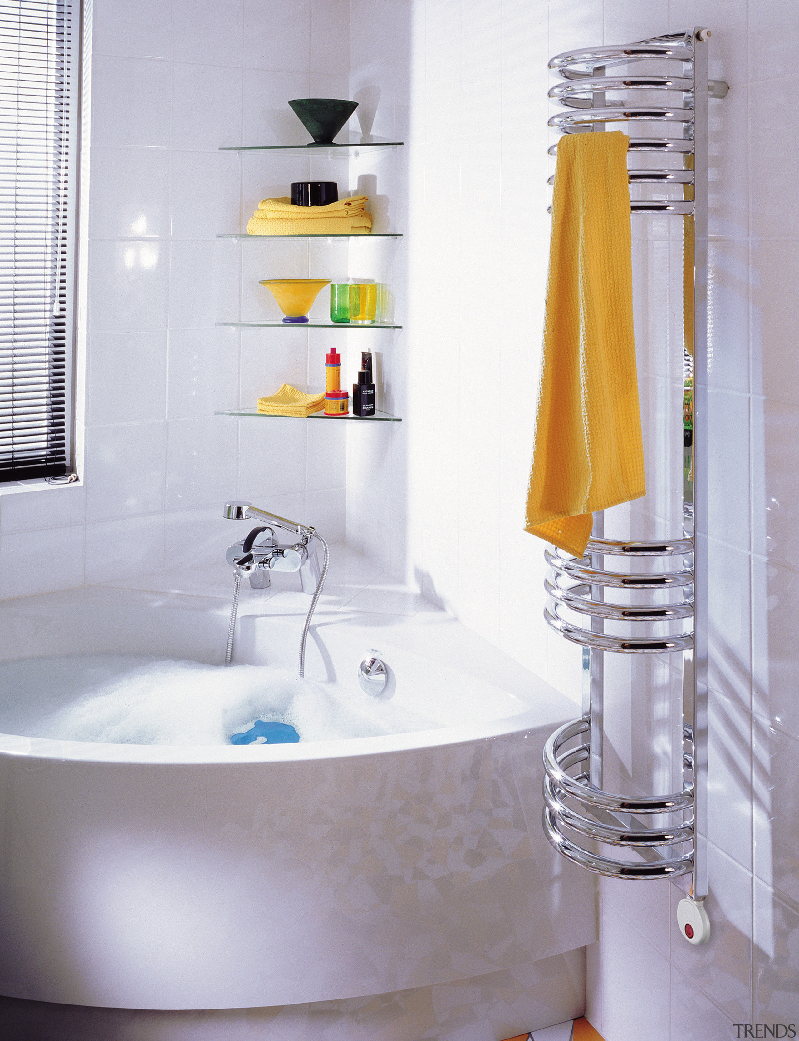 View of a bathroom which features a towel bathroom, bathroom accessory, ceramic, floor, interior design, plumbing fixture, product design, room, sink, tap, tile, yellow, gray