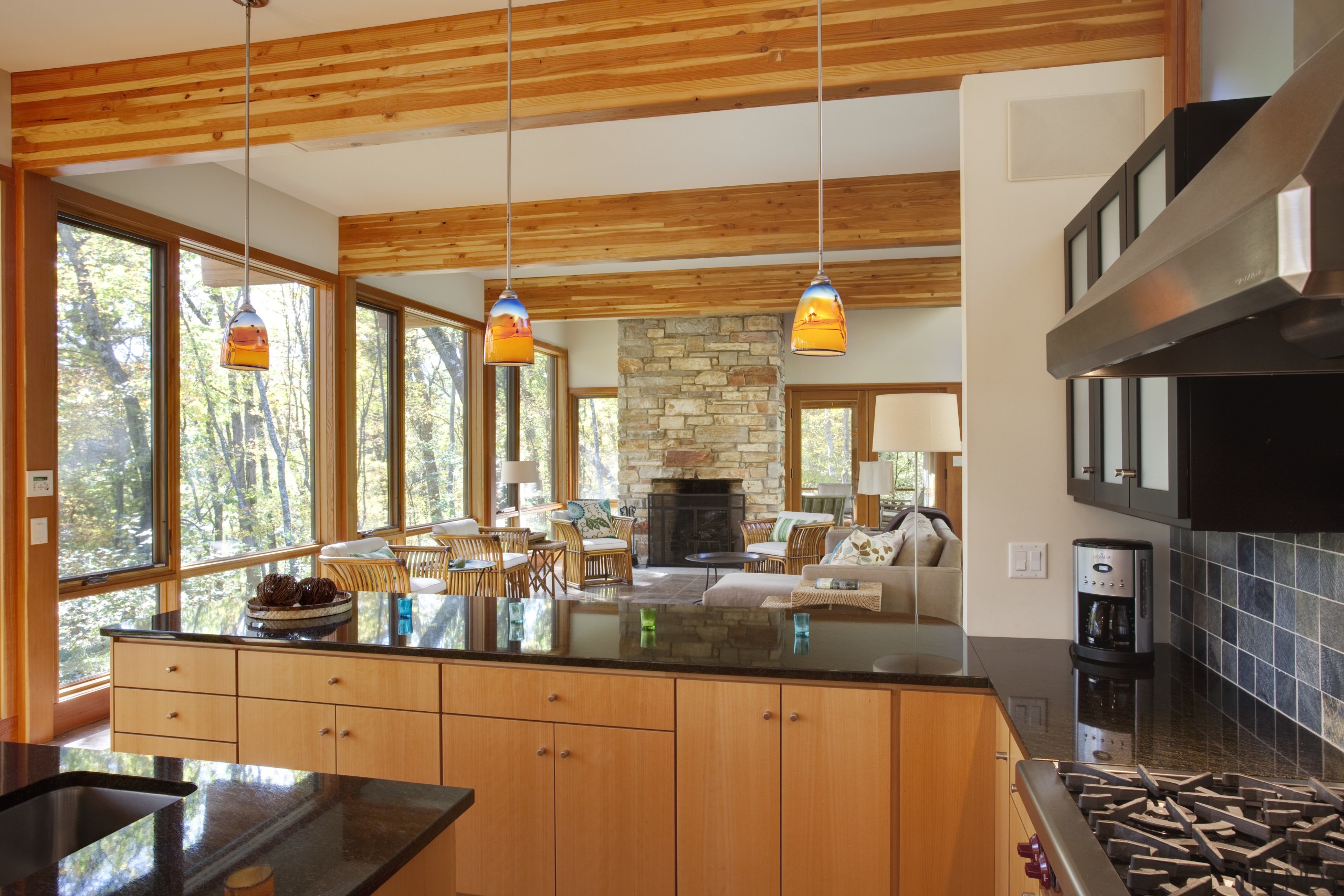 View of sunken open-plan kitchen with wooden cabinetry, cabinetry, ceiling, countertop, cuisine classique, interior design, kitchen, real estate, brown