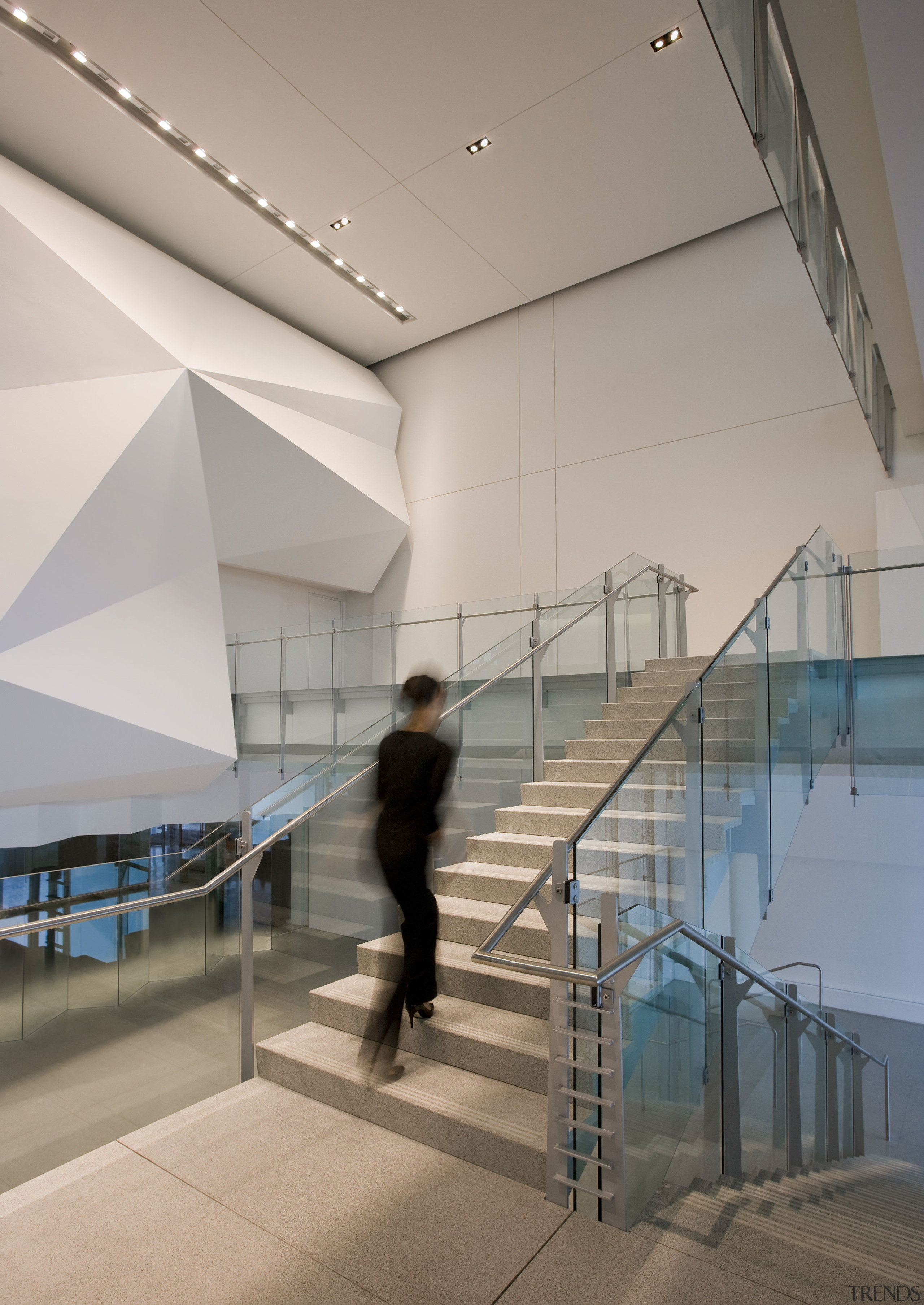 Folded white walls highlight the rear of the architecture, building, ceiling, daylighting, glass, handrail, interior design, leisure centre, stairs, tourist attraction, gray