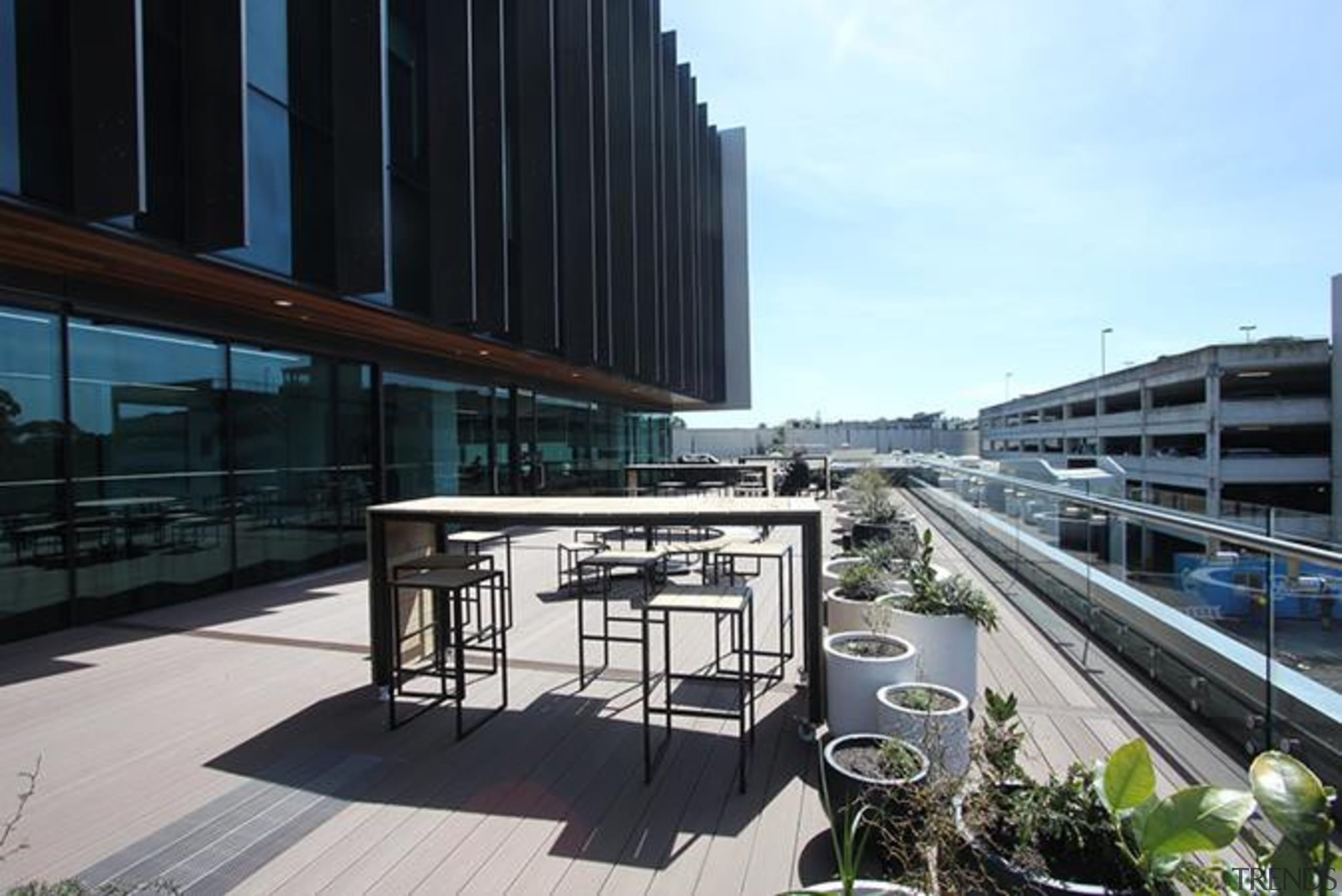 This large beautiful staff decking facility was build apartment, architecture, building, city, condominium, corporate headquarters, headquarters, metropolitan area, mixed use, real estate, reflection, urban design, black