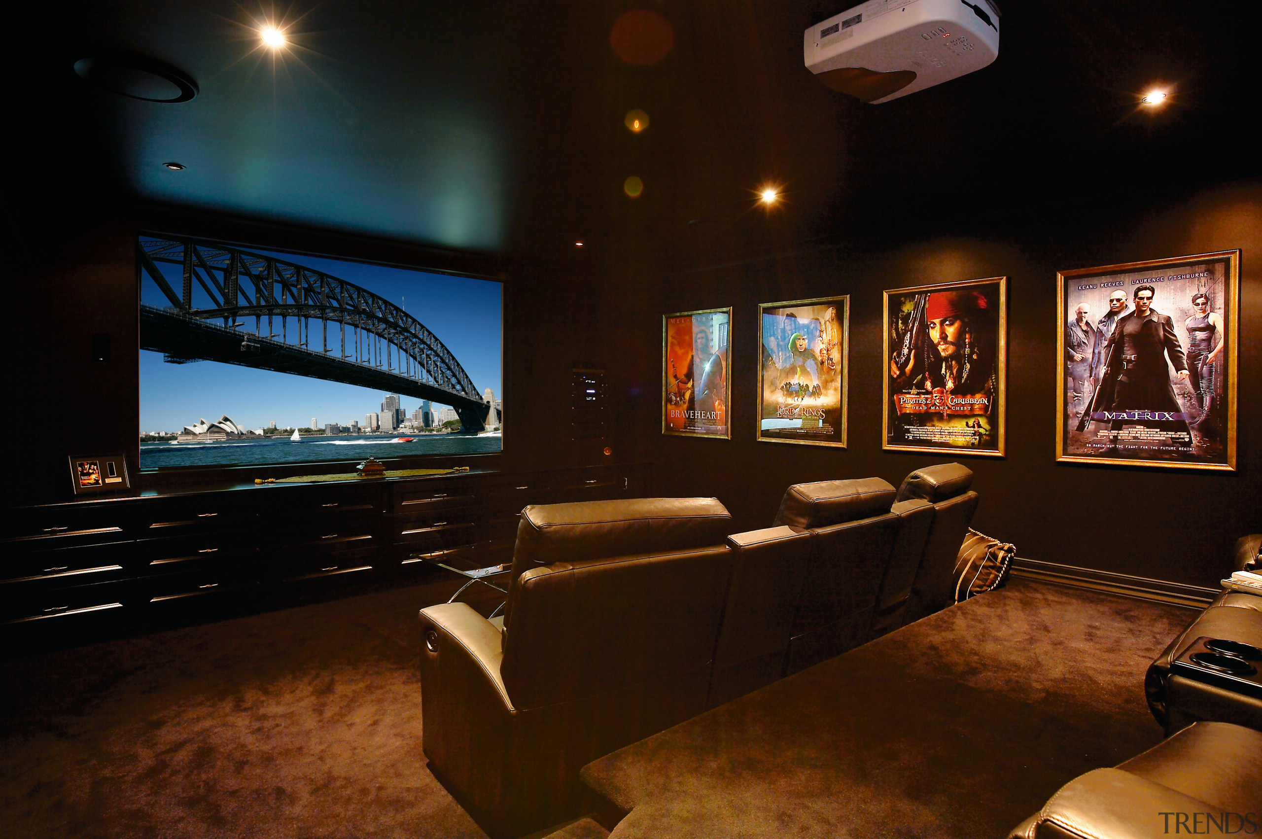 This dedicated home cinema shows the level of interior design, brown, black