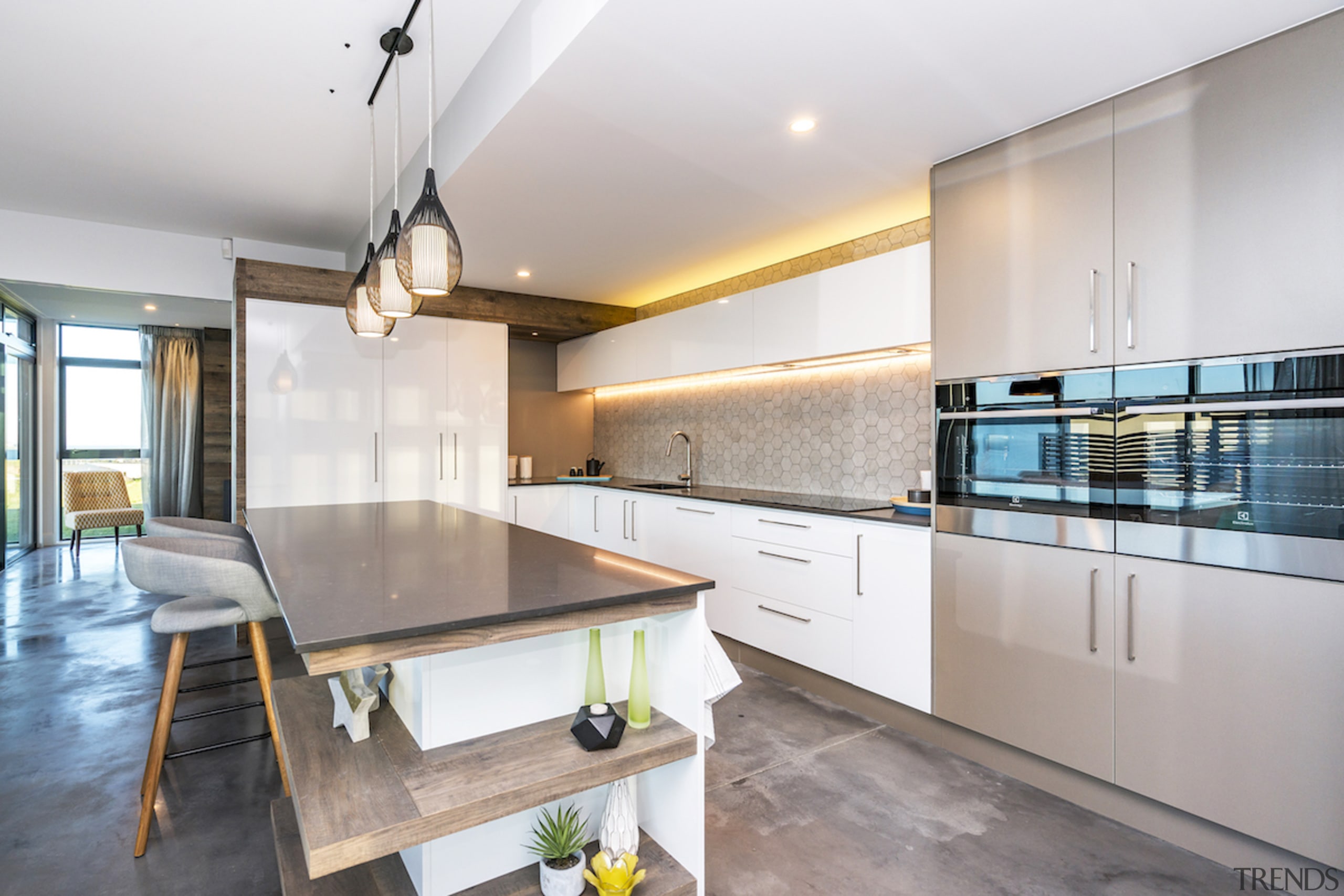 Kitchen island in sustainable home by Hybrid Homes architecture, countertop, cuisine classique, house, interior design, kitchen, property, real estate, room, gray, white