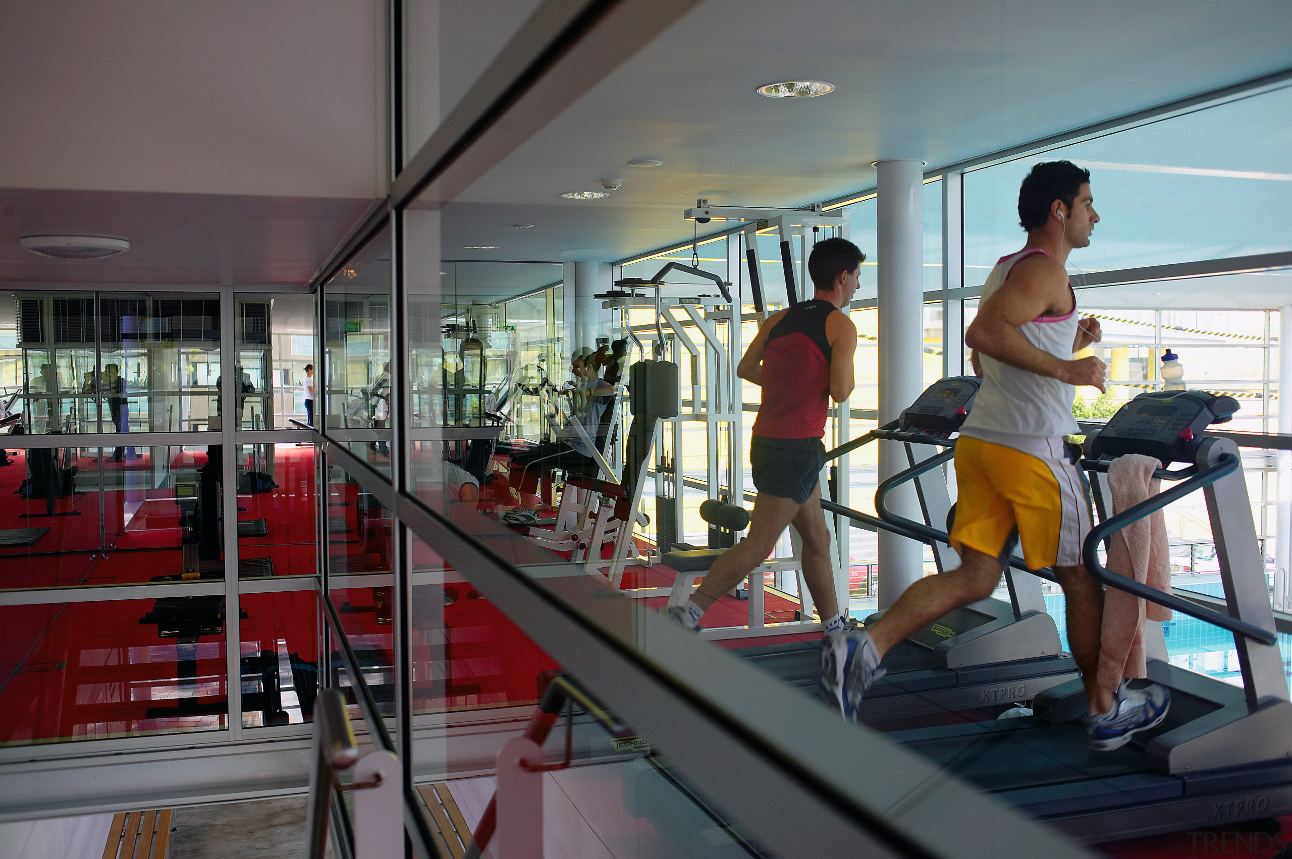 Gymnasium with extensive glazing and views. - Gymnasium gym, leisure, room, sport venue, structure, gray