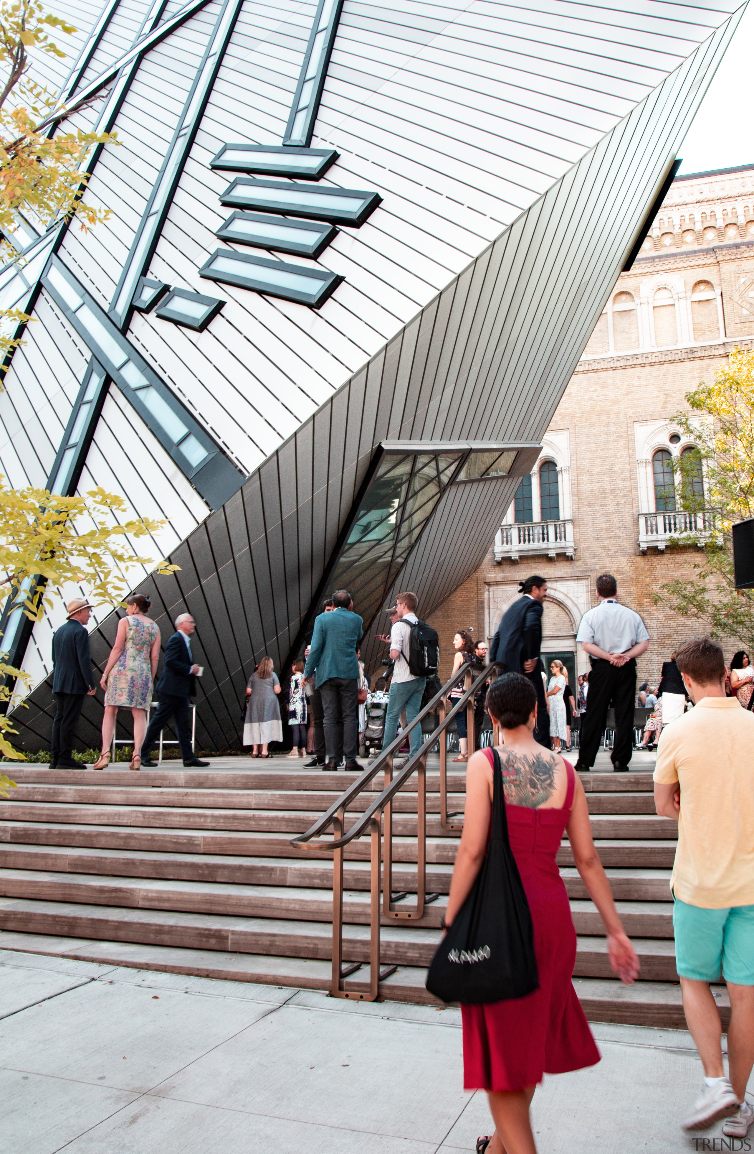 The Reed Family Plaza by Hariri Pontarini Architects. architecture, building, dress, fashion, line, pedestrian, photograph, photography, snapshot, street fashion, tourism, yellow, white