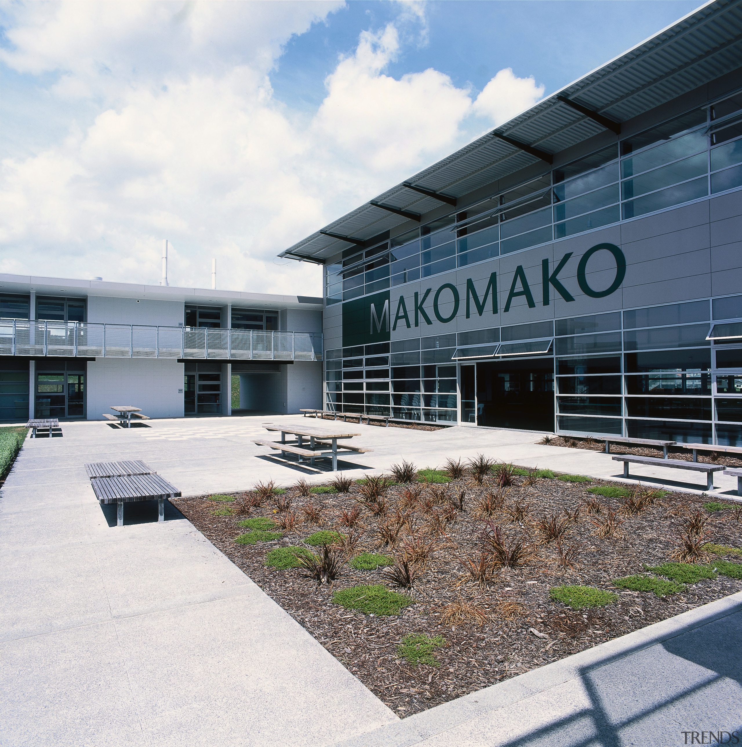Courtyard area outside classroom buildings. - Courtyard area architecture, building, corporate headquarters, facade, headquarters, real estate, white