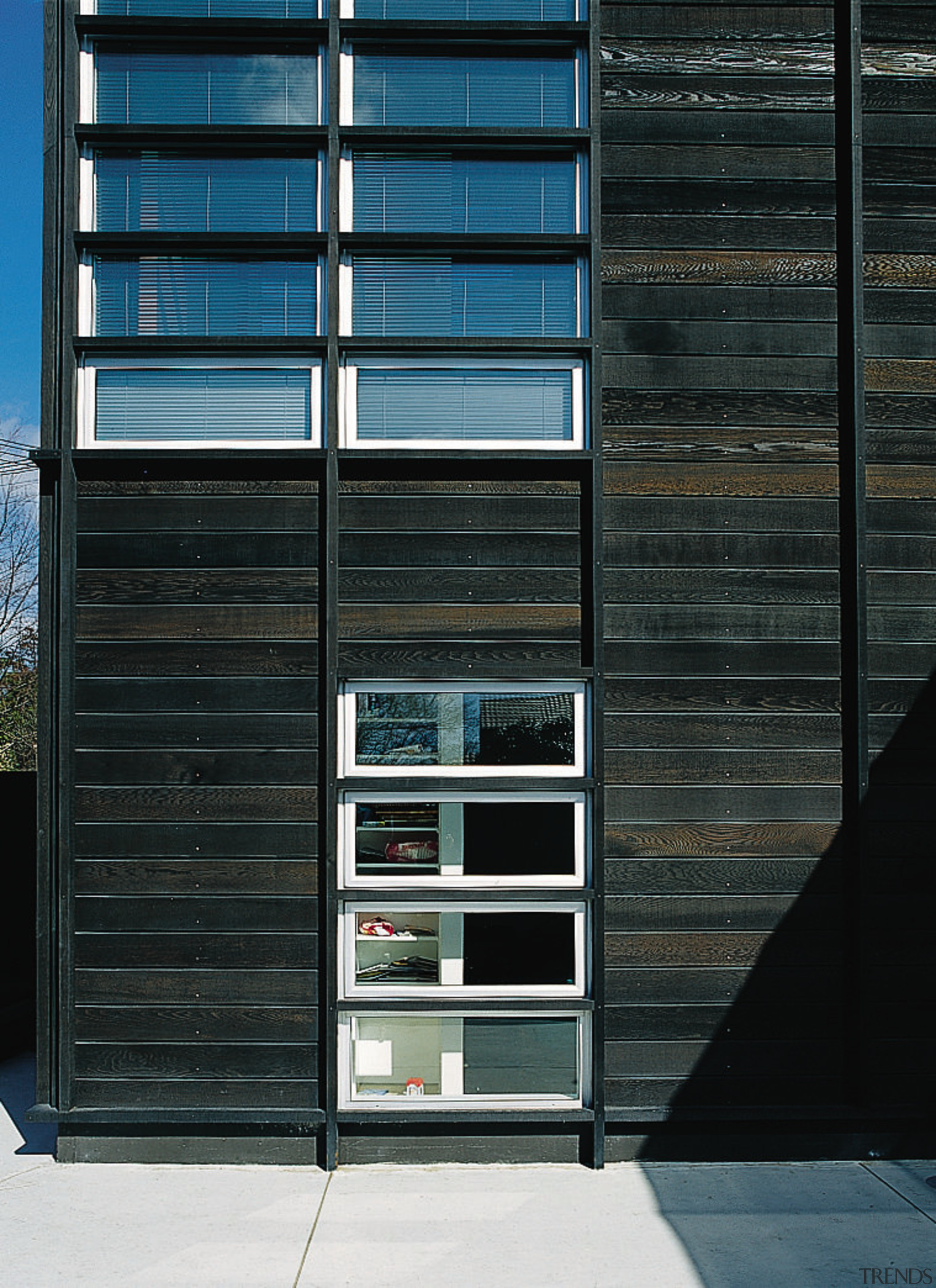 An exterior view of this contemporary home designed architecture, building, door, facade, window, wood, black
