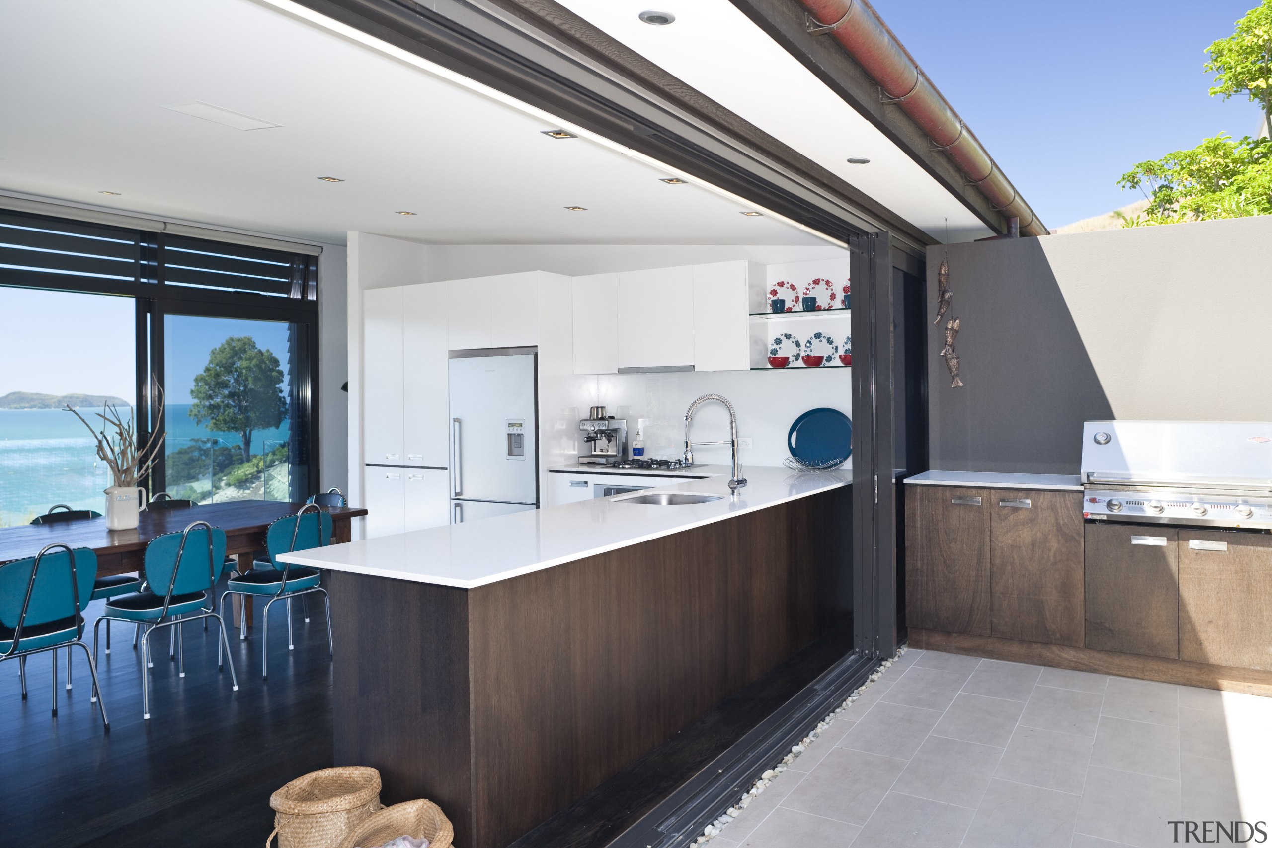 View of kitchen featuring white cabinets, beefeater barbeque house, interior design, real estate, white