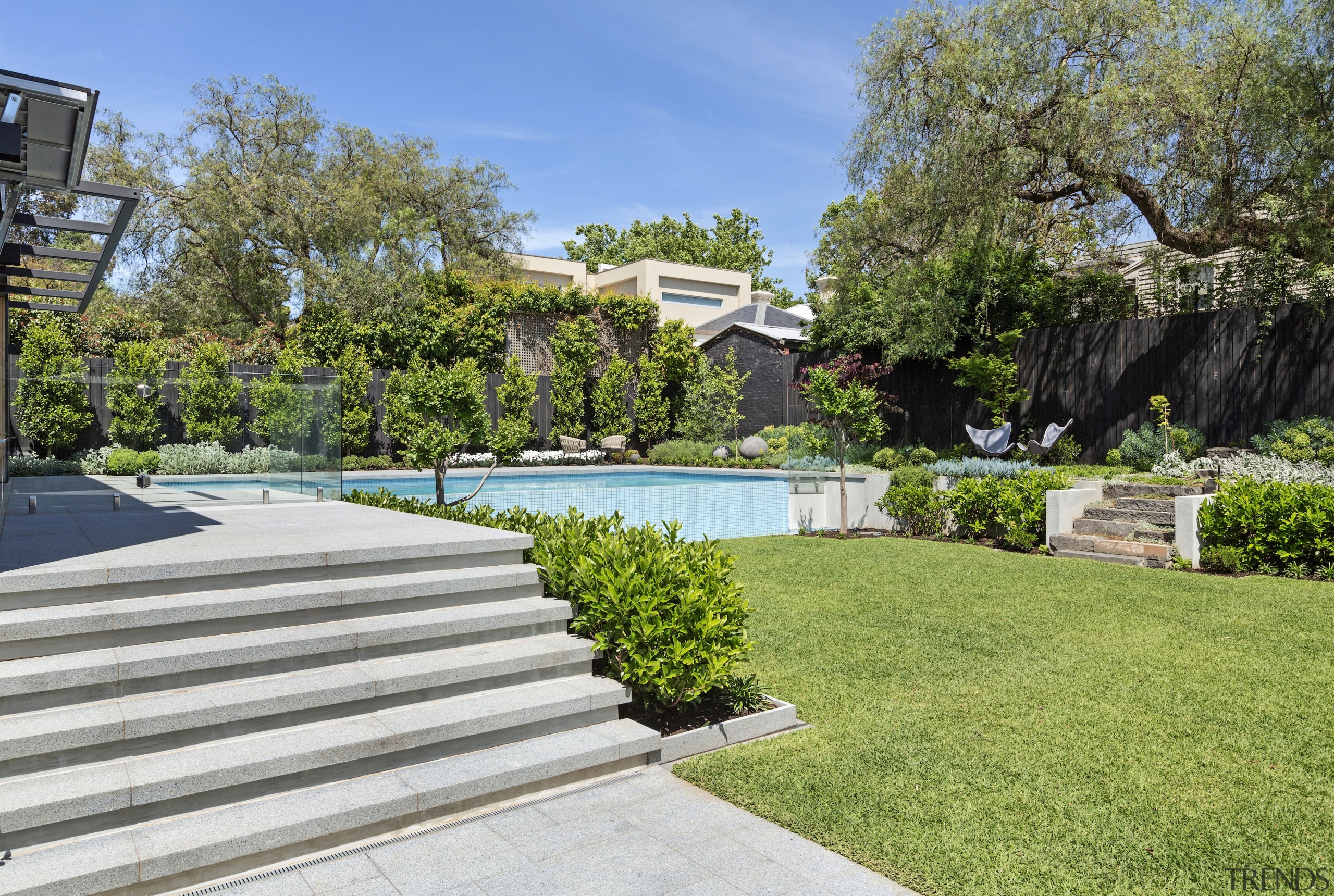 Steps leading from the poolhouse deck to the 