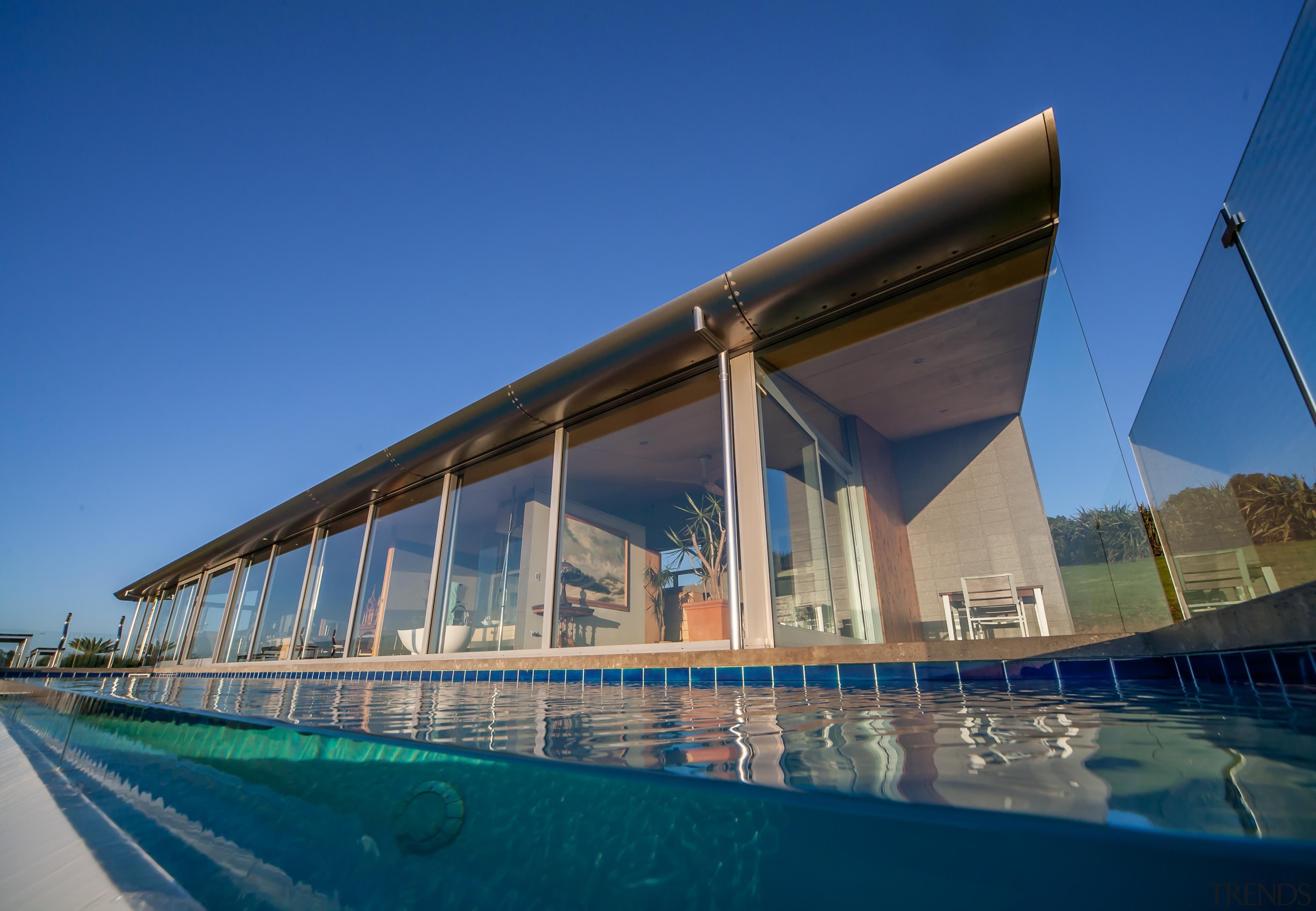 Capturing the spectacular views was a priority for architecture, bridge, corporate headquarters, fixed link, leisure centre, sky, sport venue, structure, swimming pool, water, blue