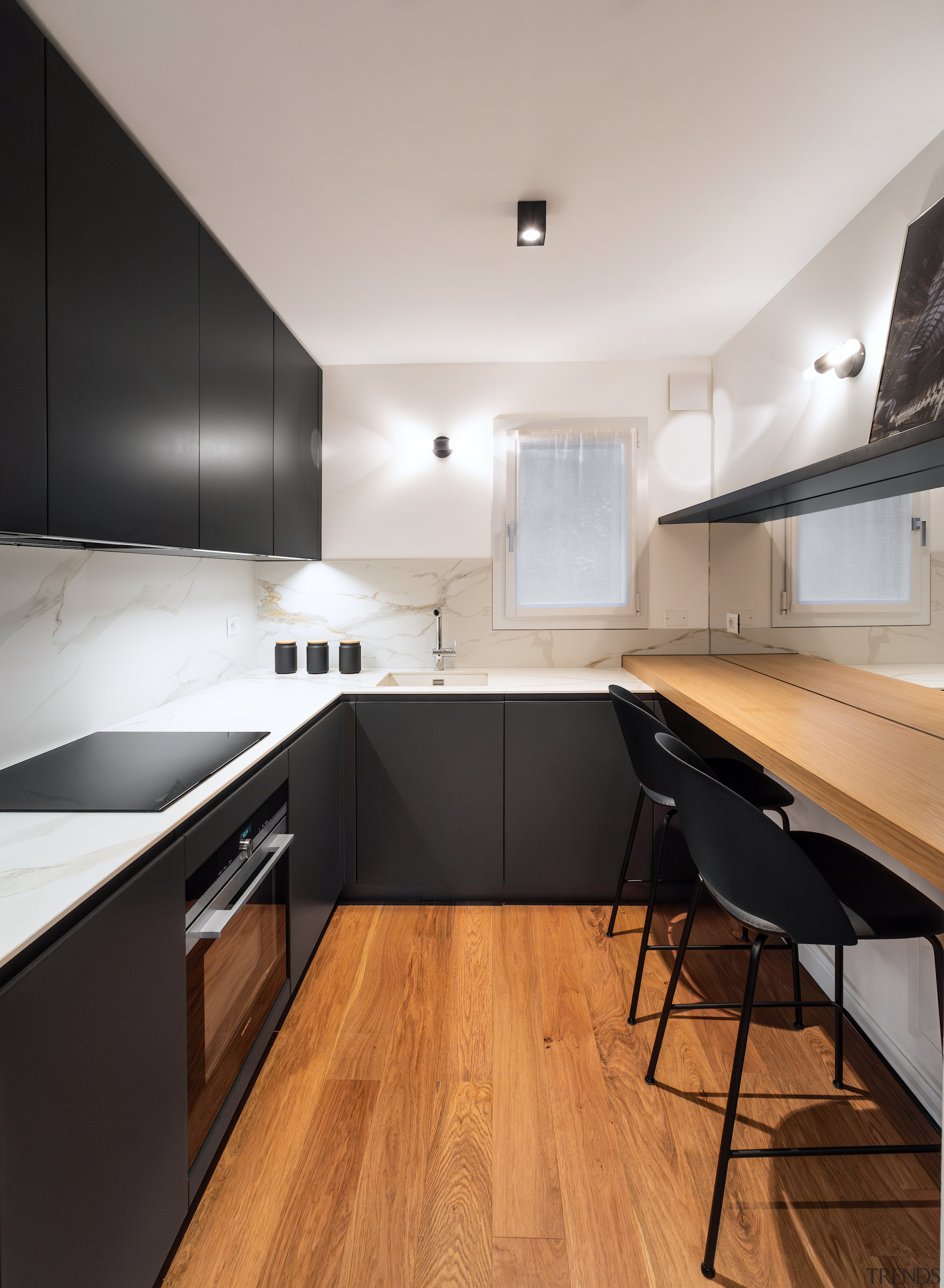 The apartment's compact and efficient operational kitchen. 