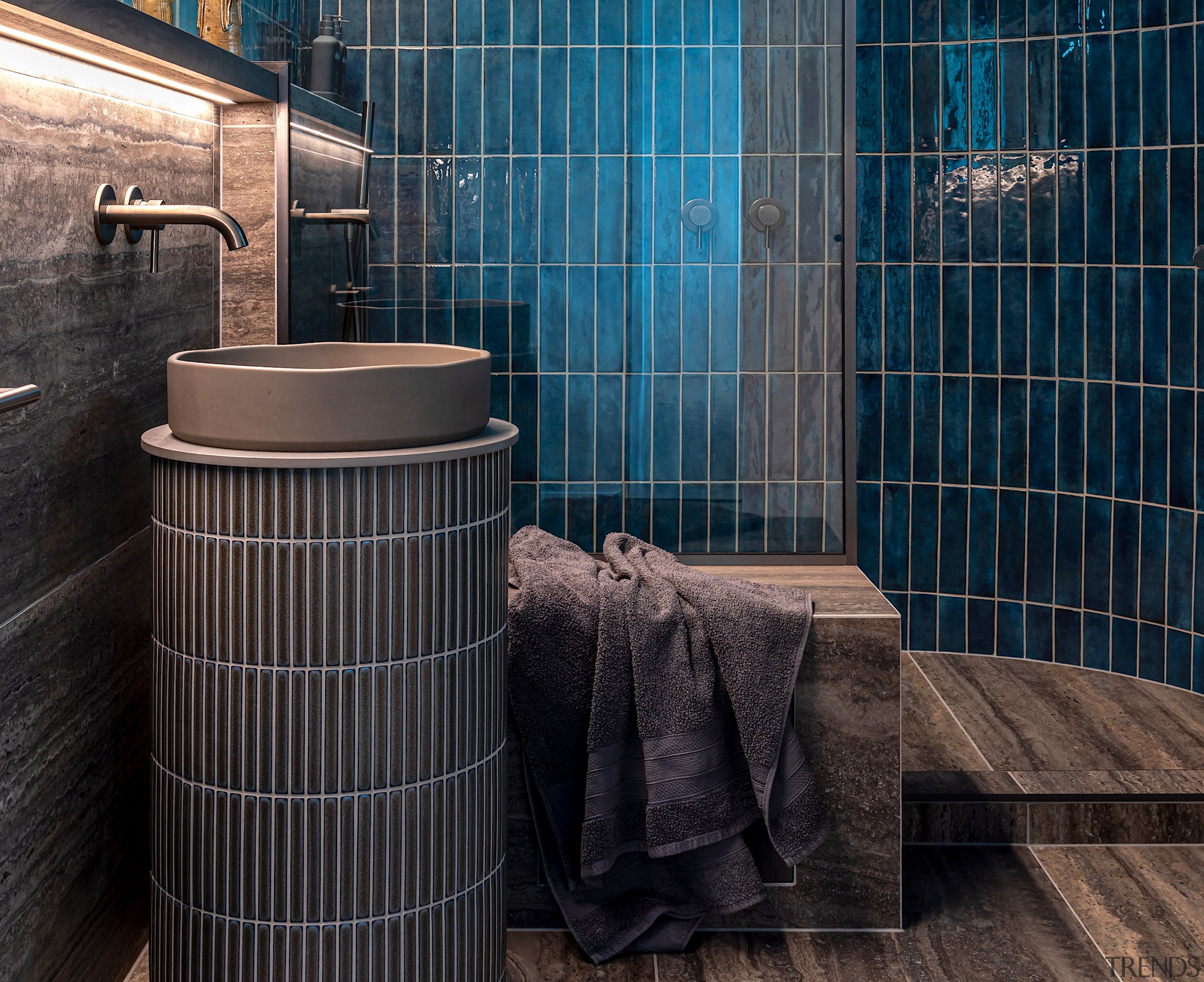The compact guest powder room captures the plumage, 
