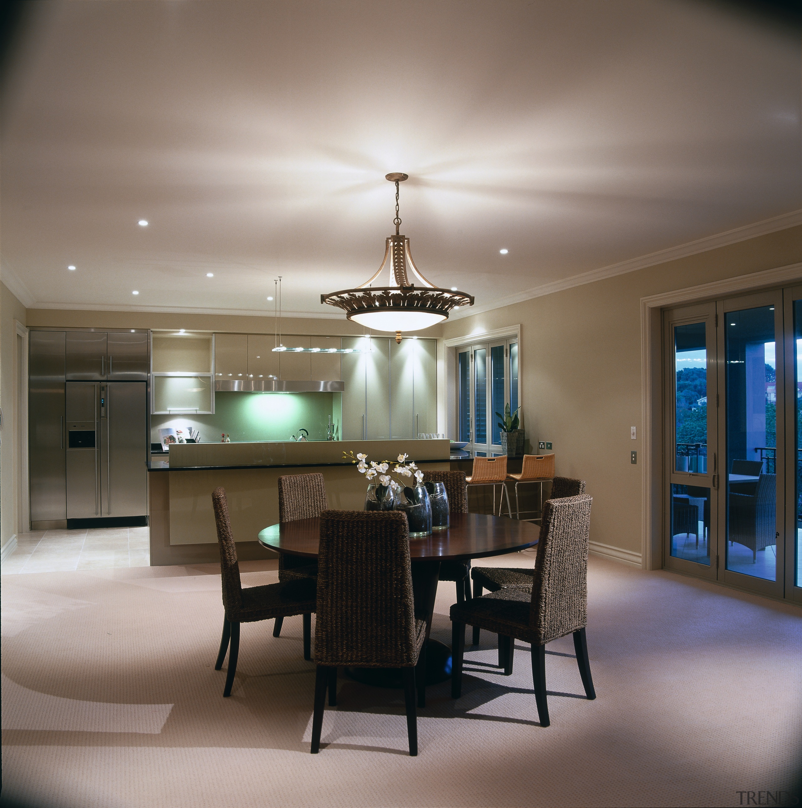 The view of a dining area and kitchen ceiling, dining room, interior design, light fixture, living room, room, table, gray