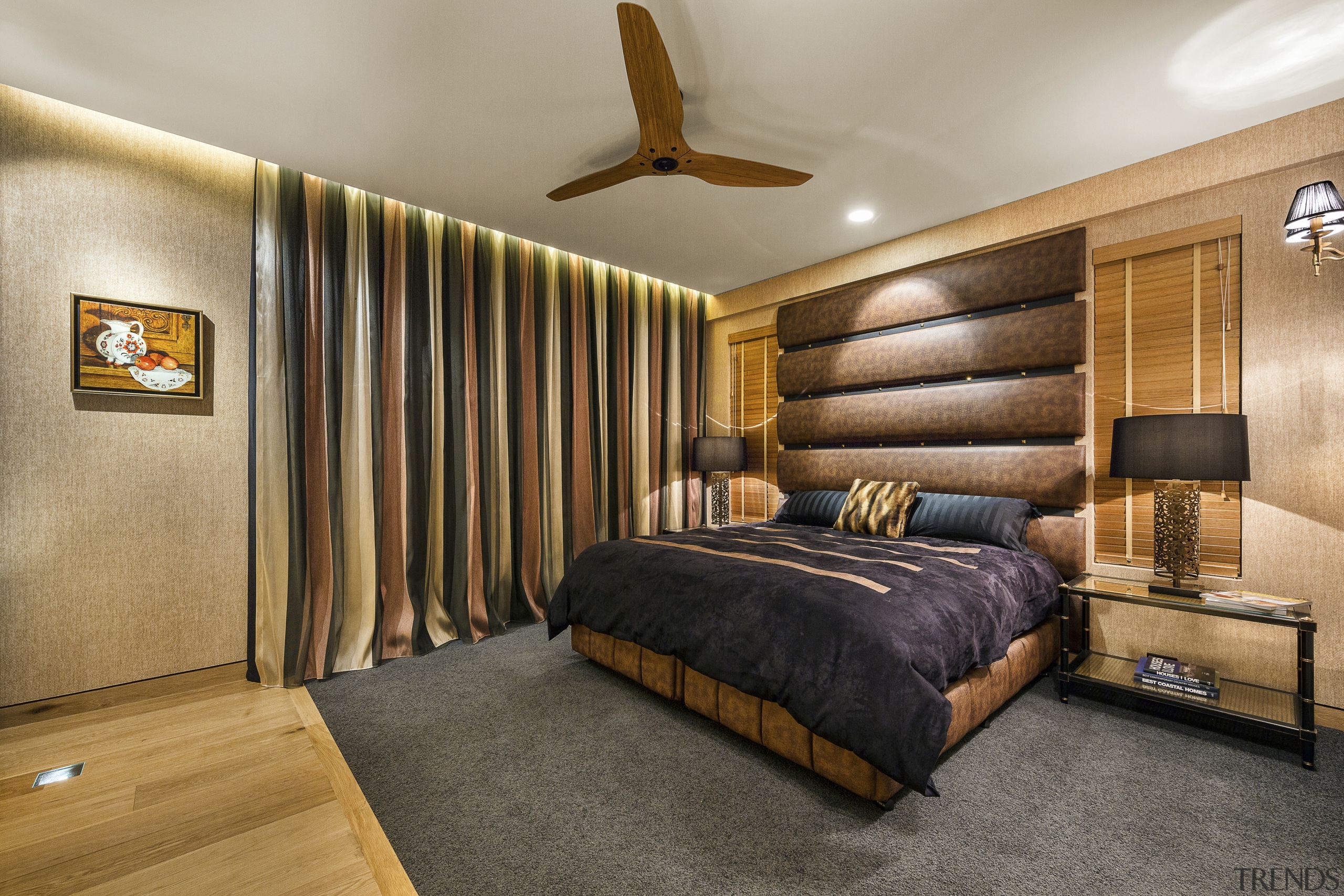 The headboard in this lavish guest bedroom echoes bed frame, bedroom, ceiling, interior design, real estate, room, suite, wood, gray, brown