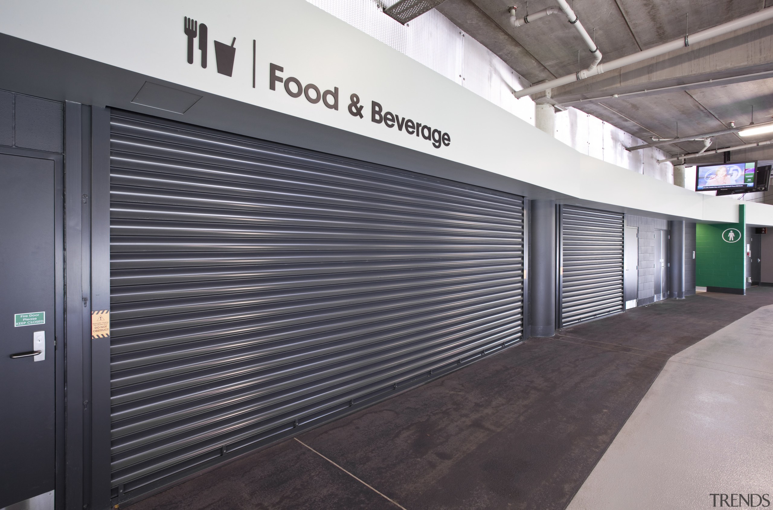 View of a metal roller door at the gray, black