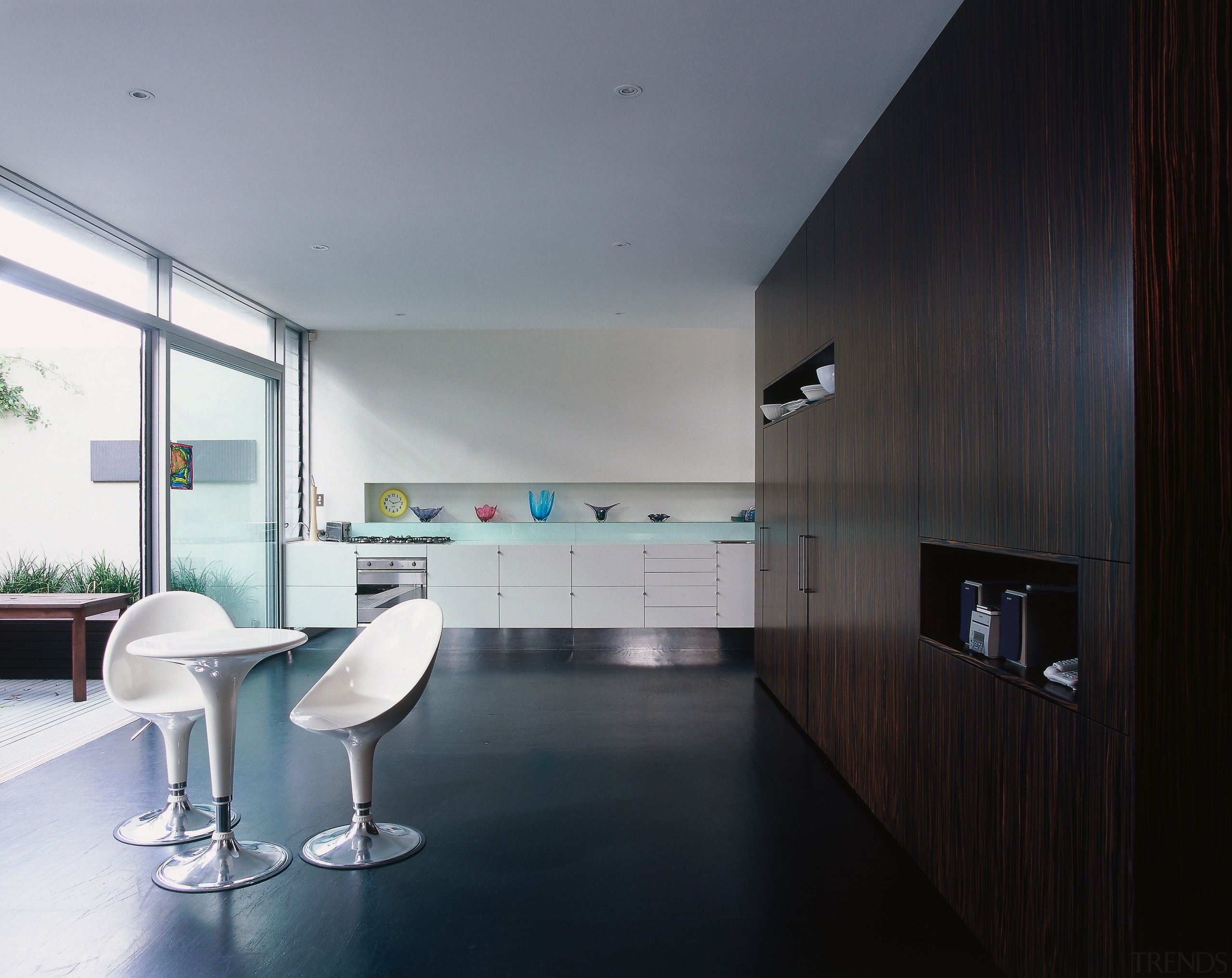 The kitchen of a house with high ceilings architecture, ceiling, daylighting, floor, house, interior design, kitchen, product design, real estate, black, gray