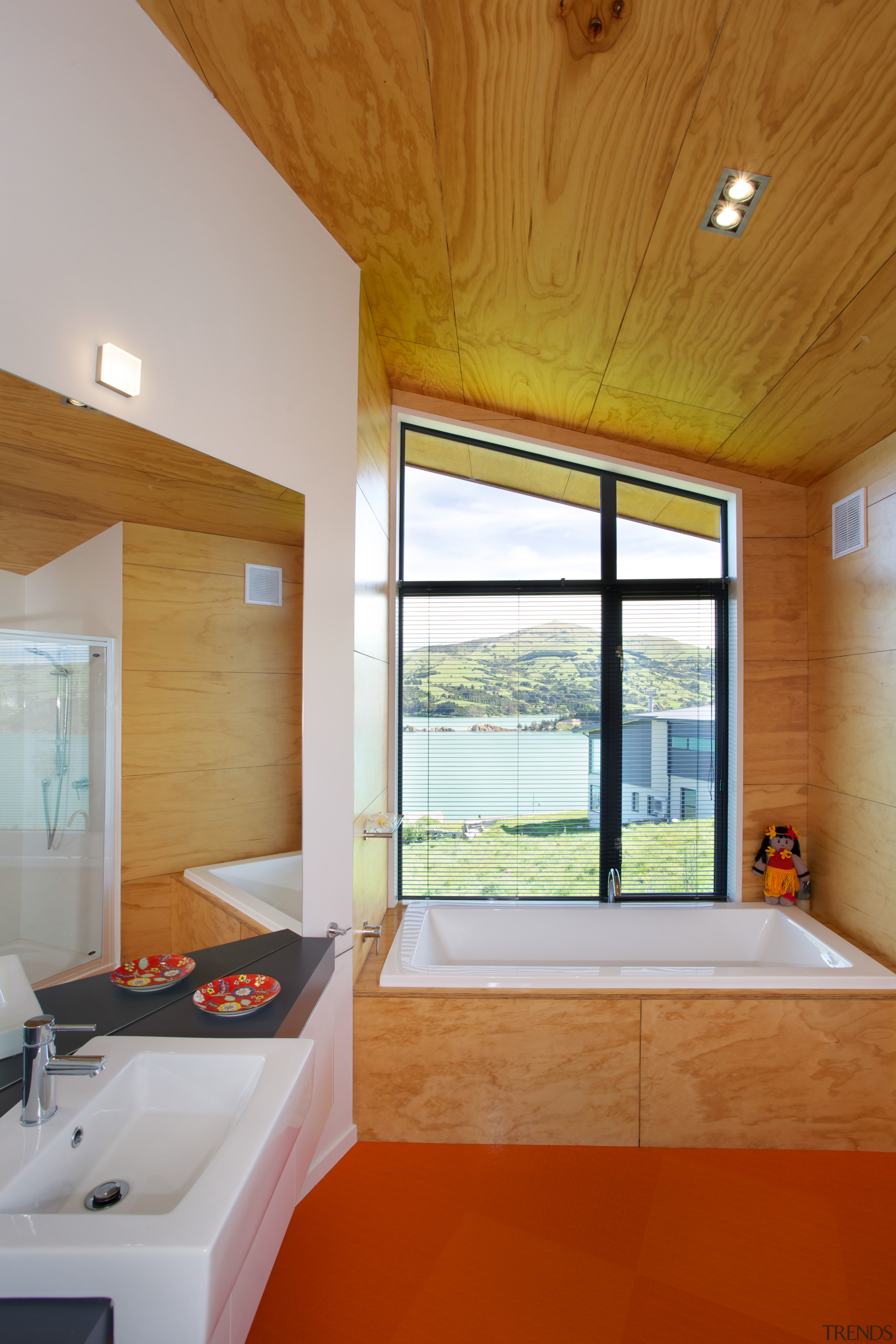 The master bathroom in this holiday home features architecture, bathroom, ceiling, daylighting, estate, floor, home, house, interior design, real estate, room, window, wood, brown, gray