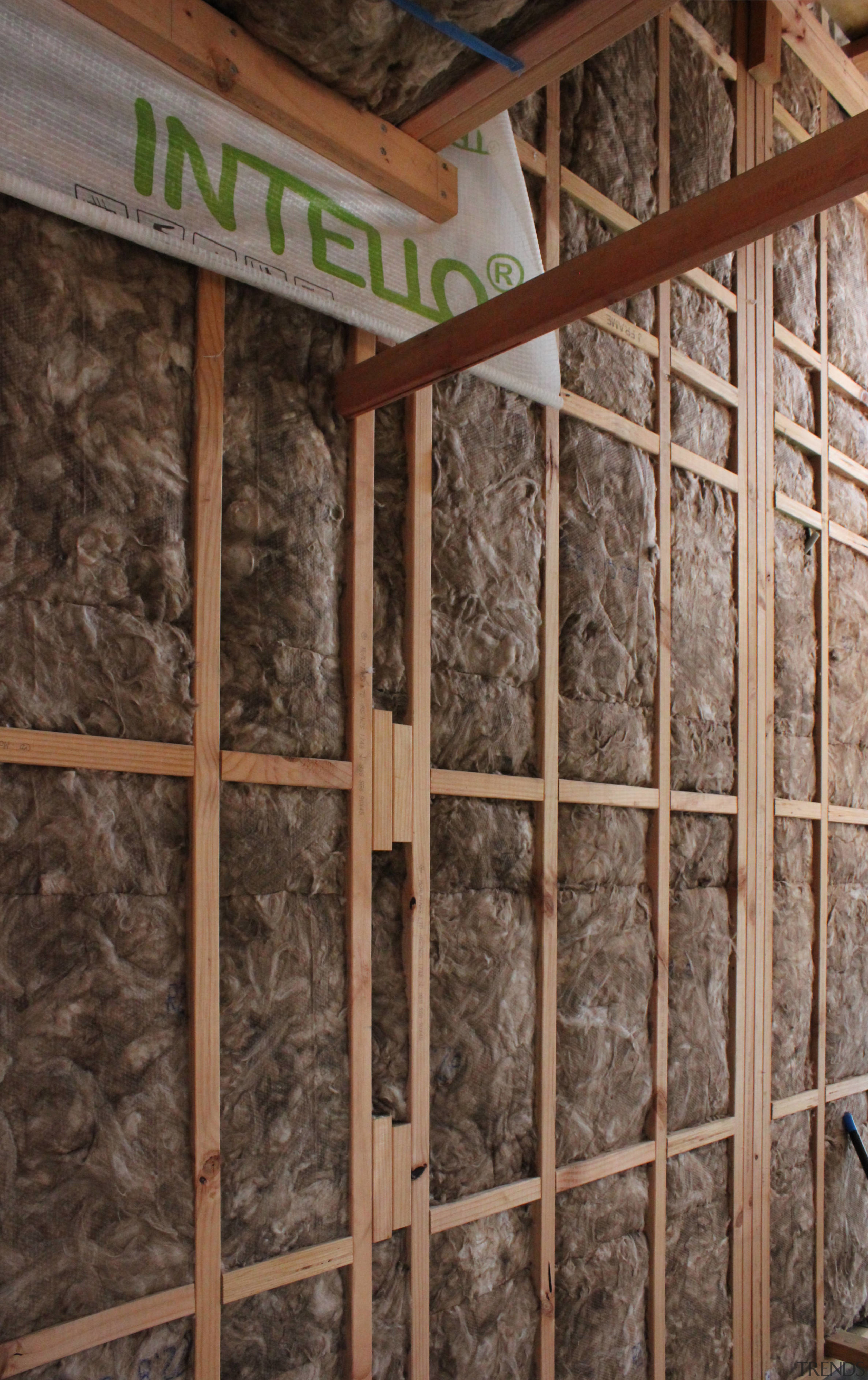 Earthwool glasswool by Knauf Insulation provides a super-soft wall, window, wood, brown