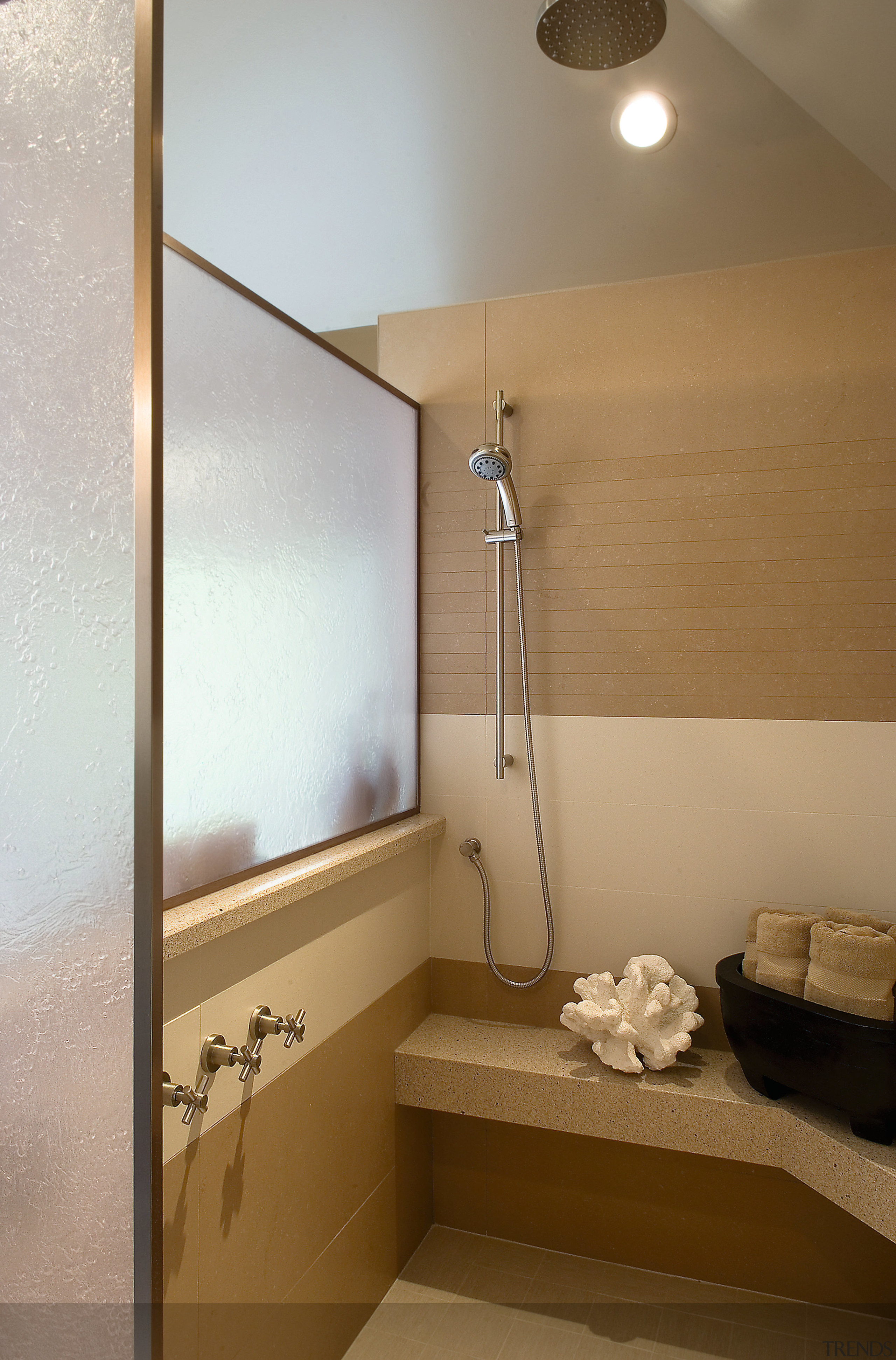 A view of a bathroom designed by Petersen bathroom, ceiling, floor, interior design, plumbing fixture, room, brown