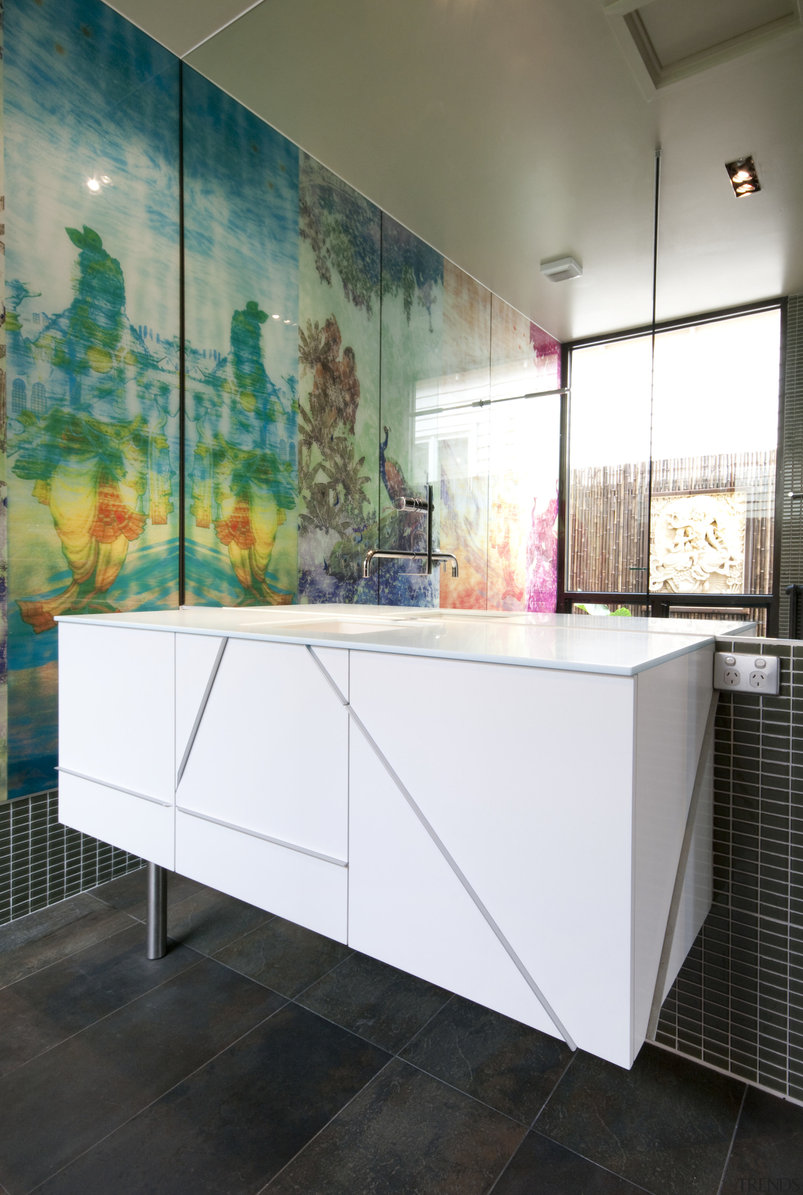 Bathroom with colourful wall print and white vanity. architecture, bathroom, floor, flooring, glass, home, house, interior design, product design, room, tile, wall, white