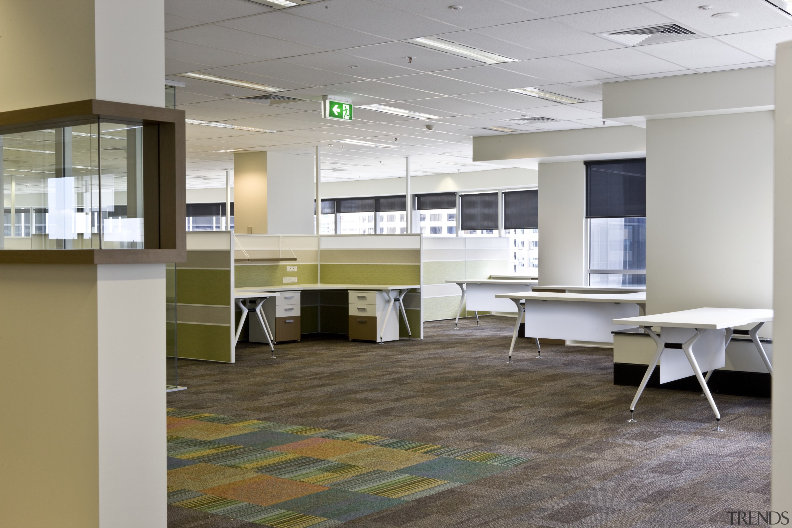 Interior view of an office which includes office floor, flooring, furniture, interior design, office, gray, brown