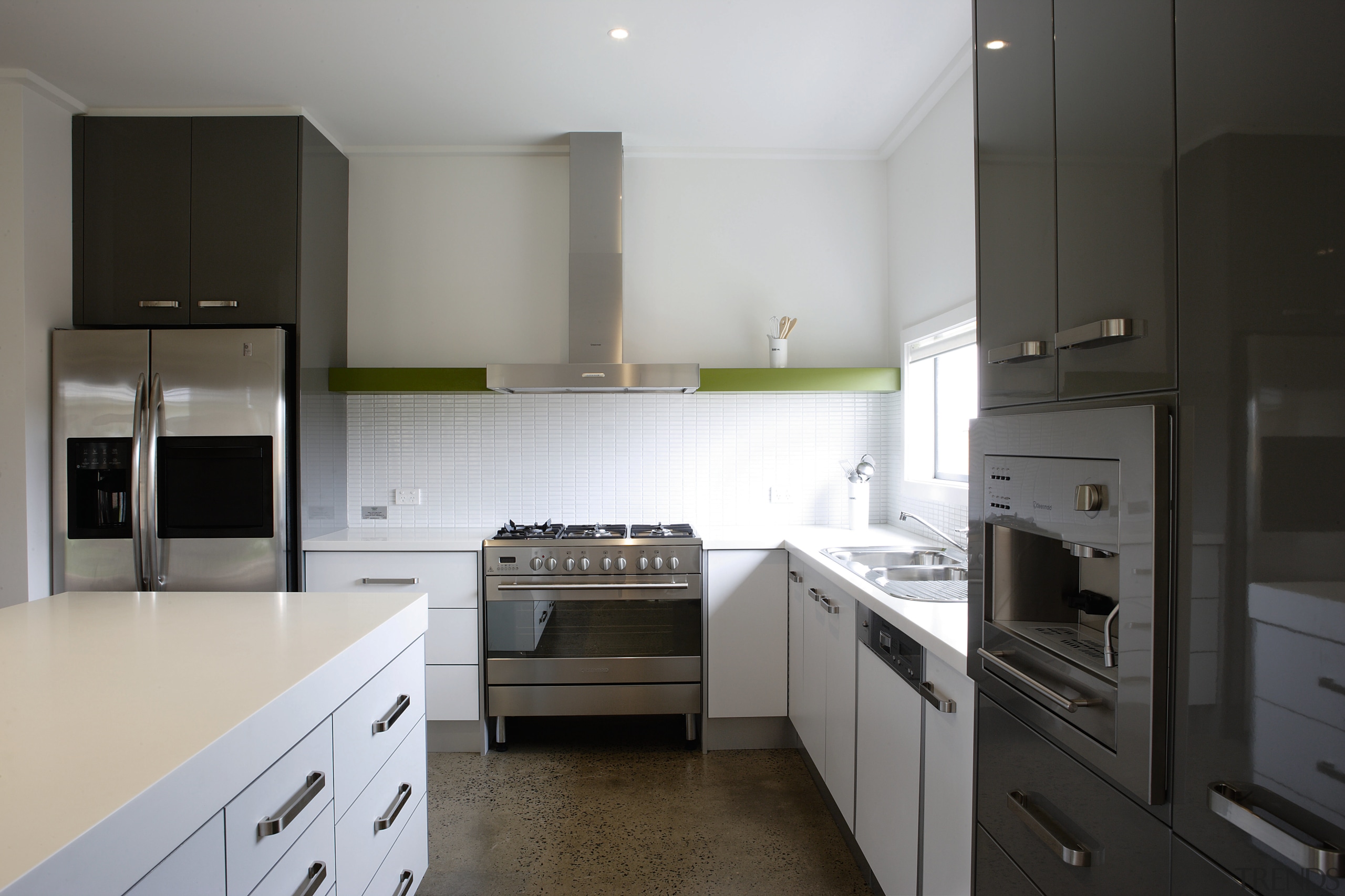 Kitchen with cream cabinetry and stainless steel appliances. cabinetry, countertop, cuisine classique, home appliance, interior design, kitchen, real estate, room, black, gray, white