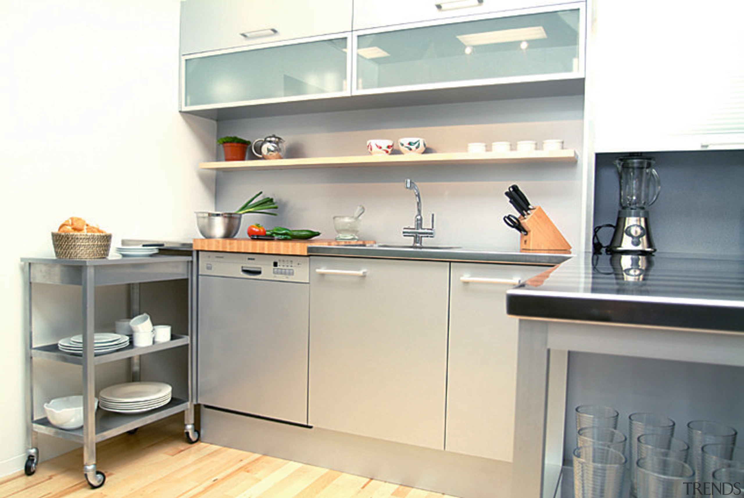 A semi-industrial looking kitchen. This area features a countertop, home appliance, interior design, kitchen, major appliance, product design, room, shelf, white, gray