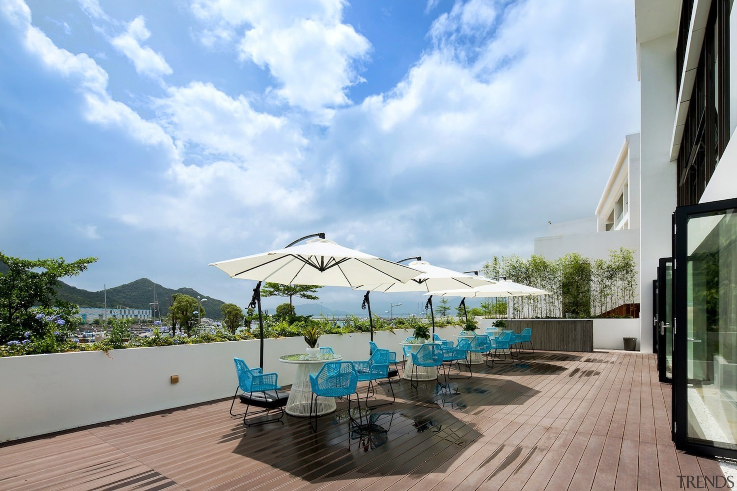 There are expansive harbour views – and a condominium, estate, home, house, leisure, property, real estate, resort, roof, shade, sky, swimming pool, vacation, villa, teal